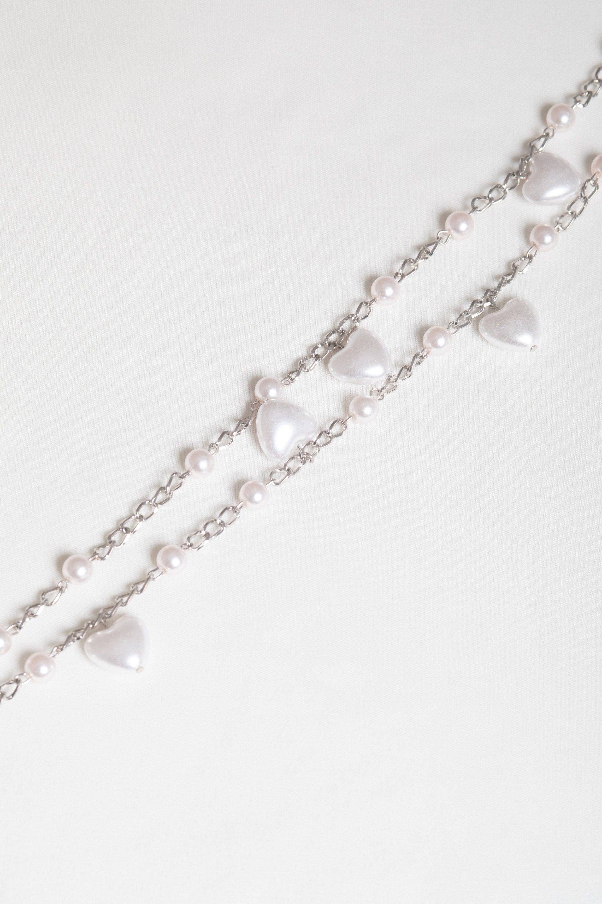 ميكا حزام نسائي على شكل قلوب ومزين باللؤلؤ