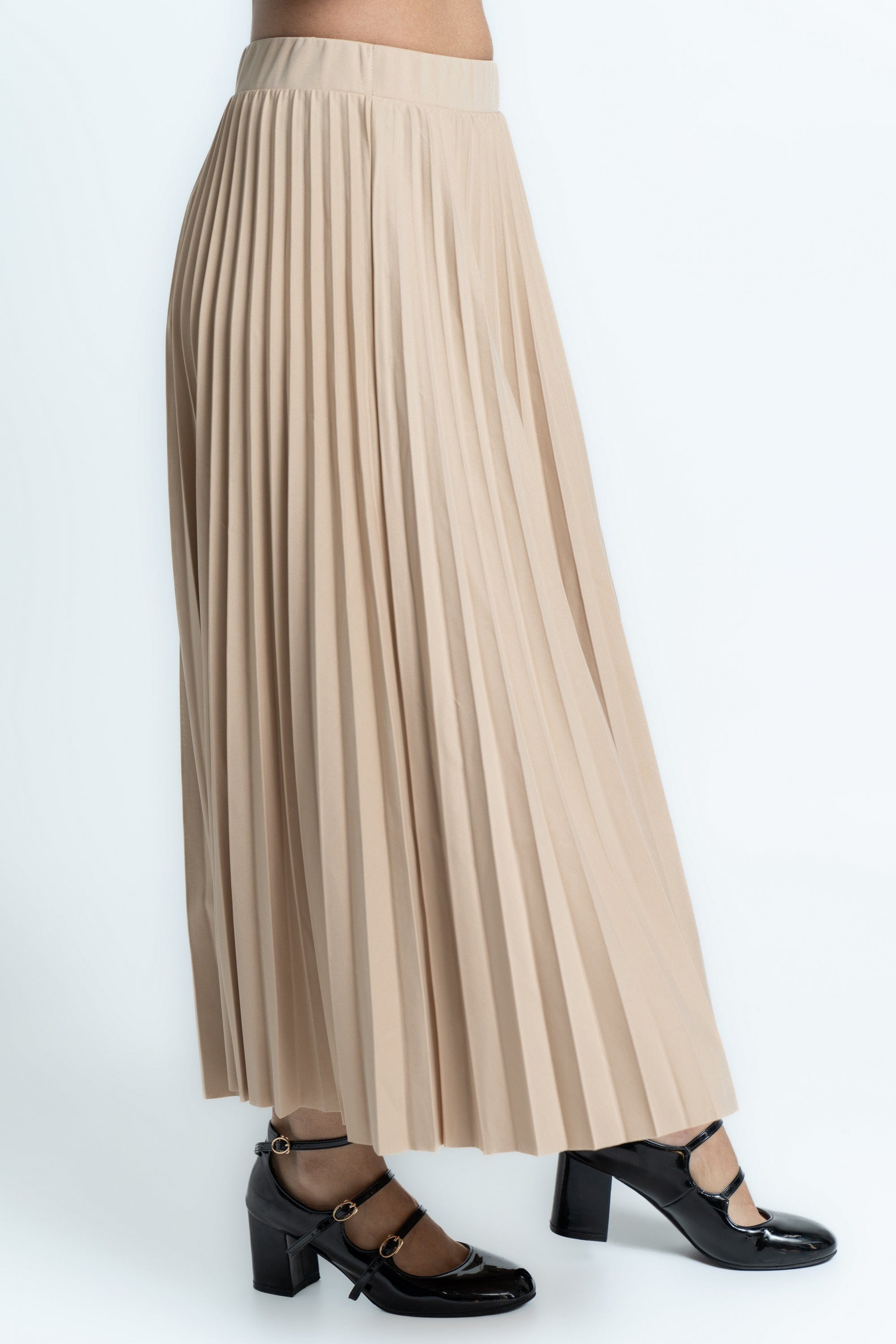 ميكا تنورة ميدي سادة بليسية