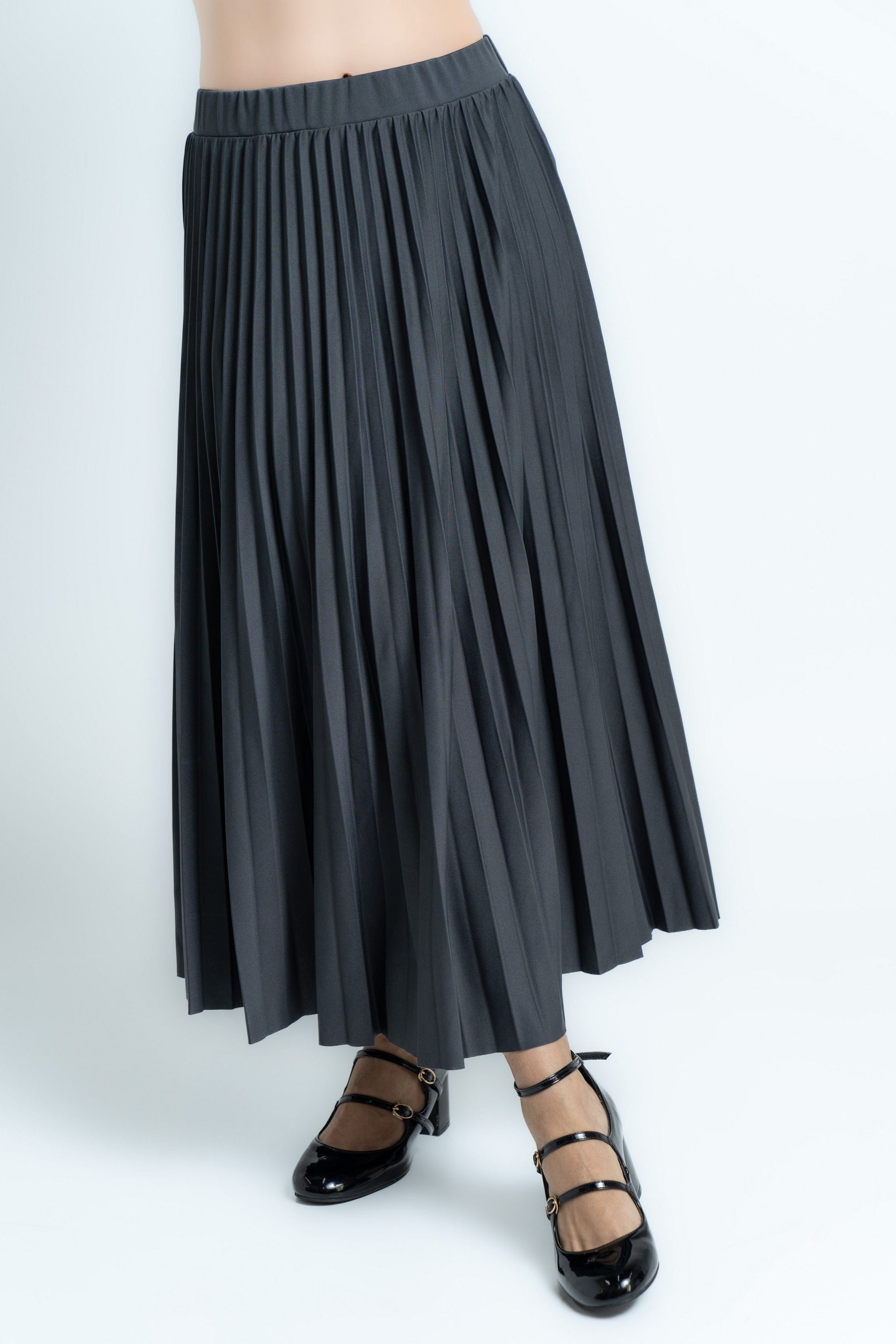 ميكا تنورة ميدي سادة بليسية