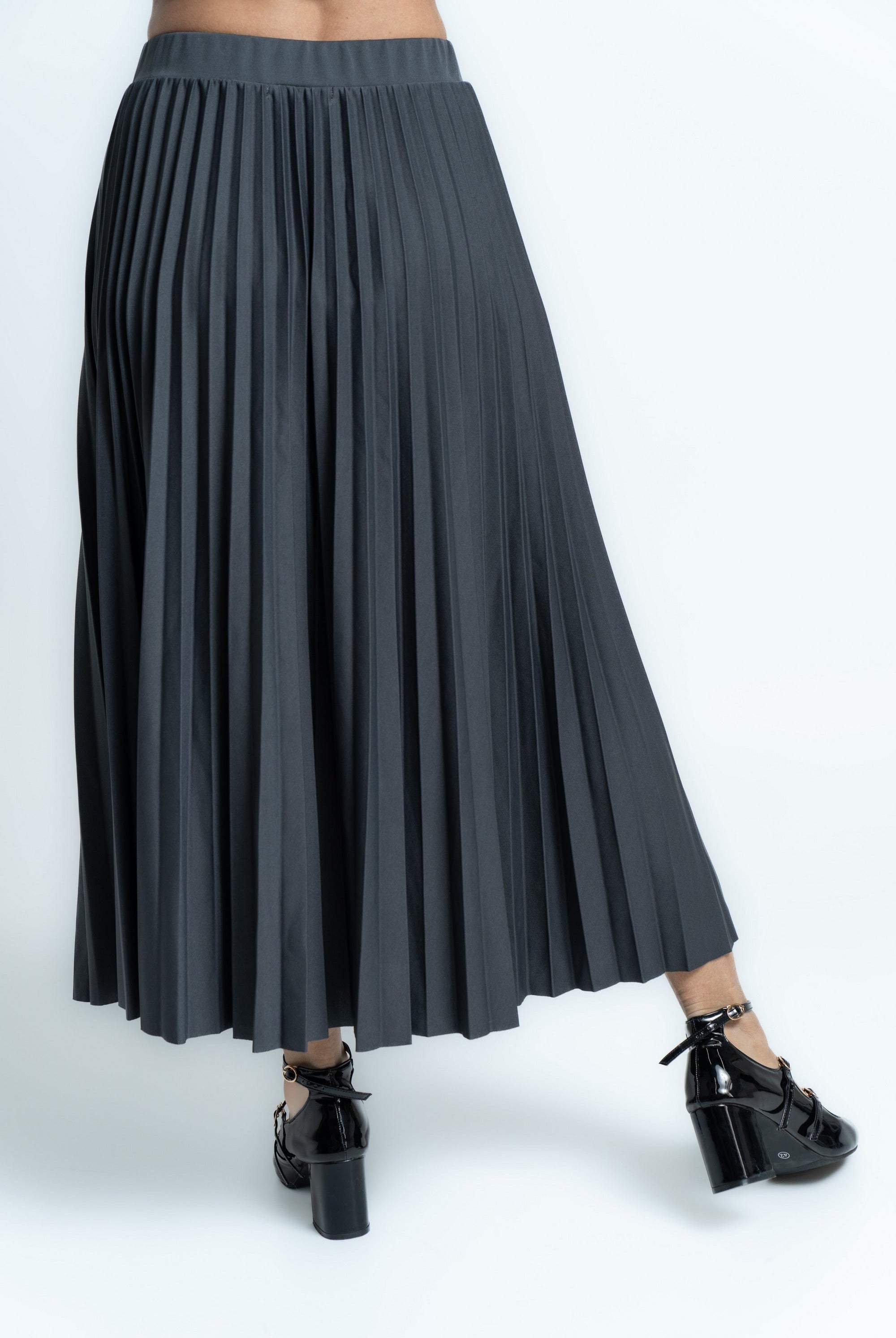 ميكا تنورة ميدي سادة بليسية