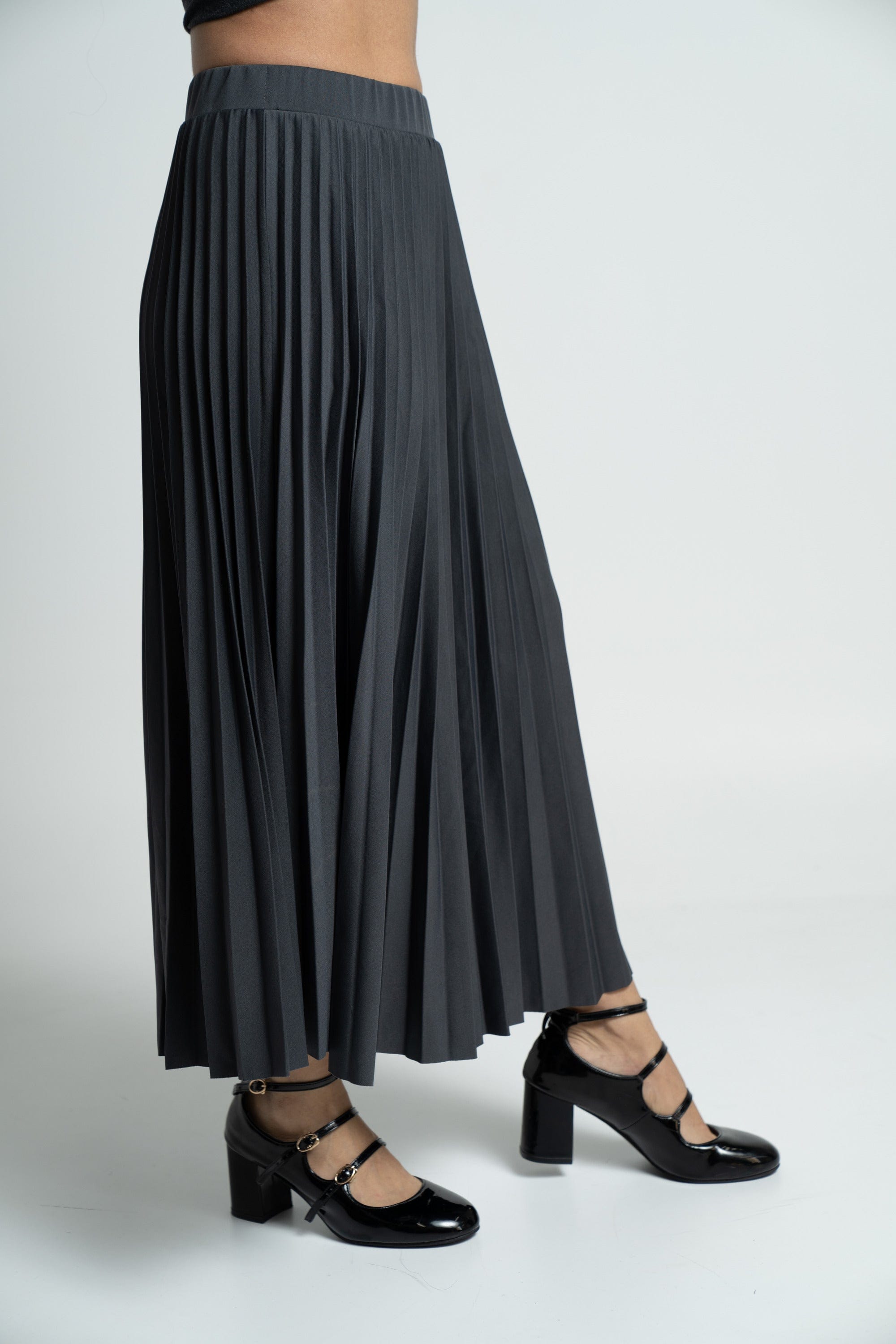 ميكا تنورة ميدي سادة بليسية