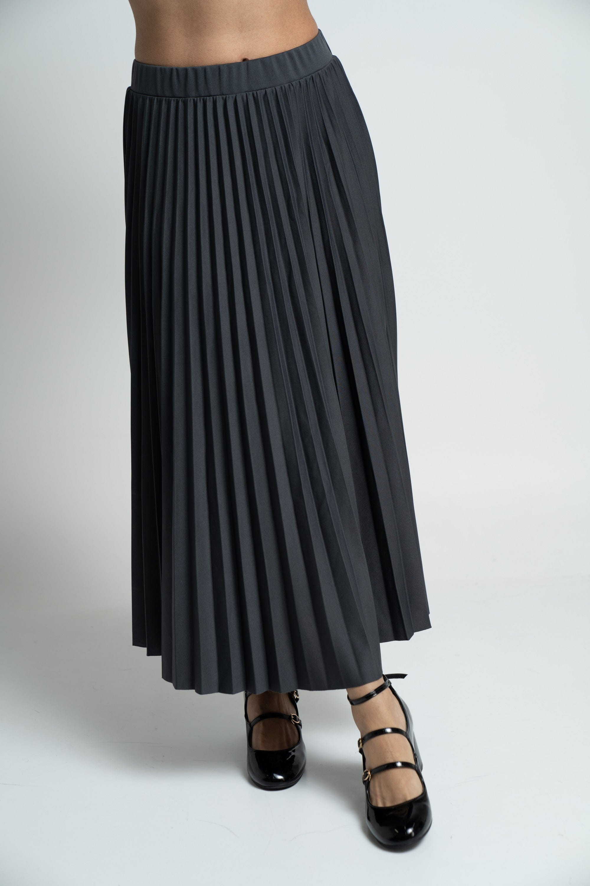 ميكا تنورة ميدي سادة بليسية