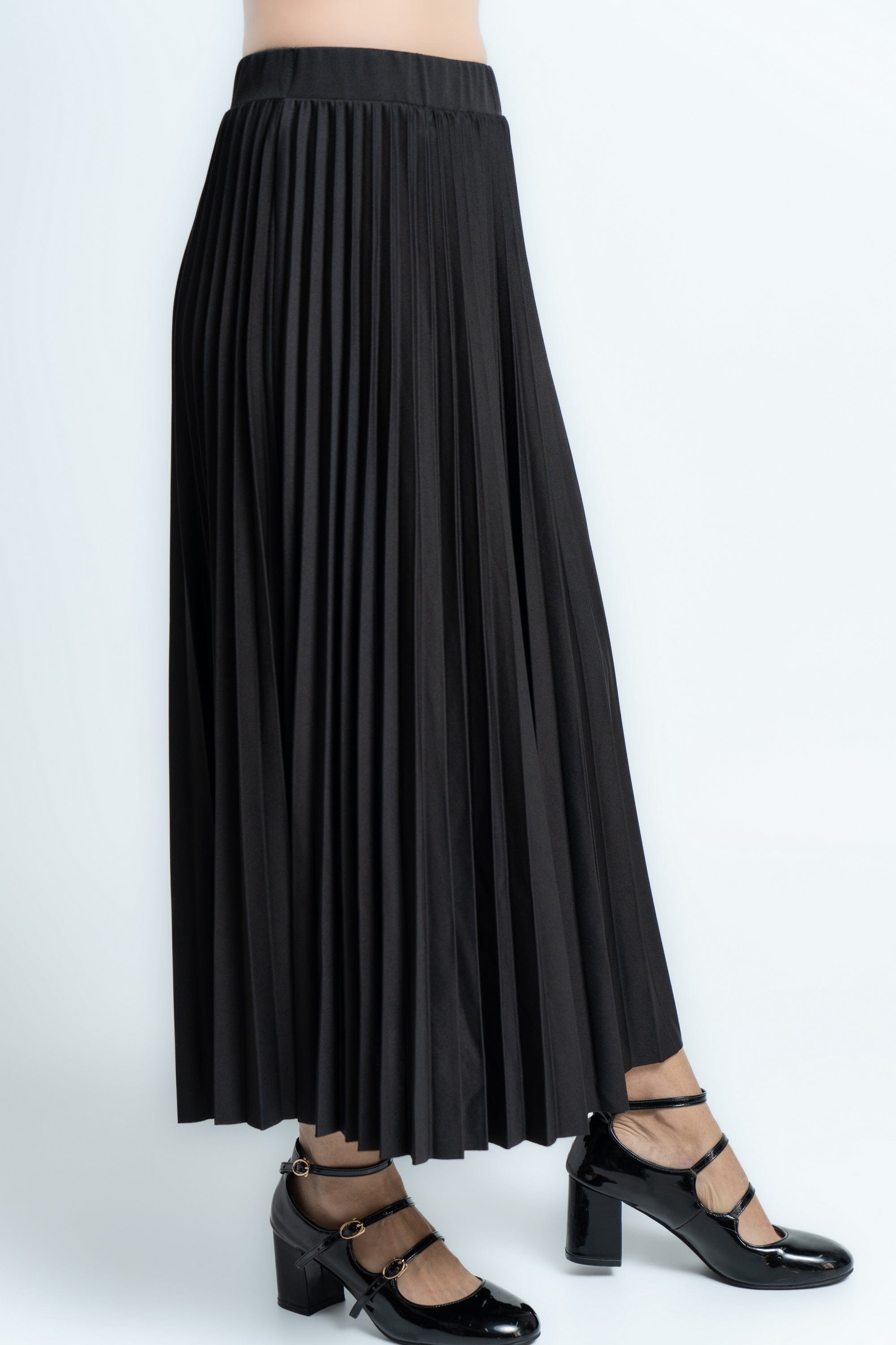 ميكا تنورة ميدي سادة بليسية