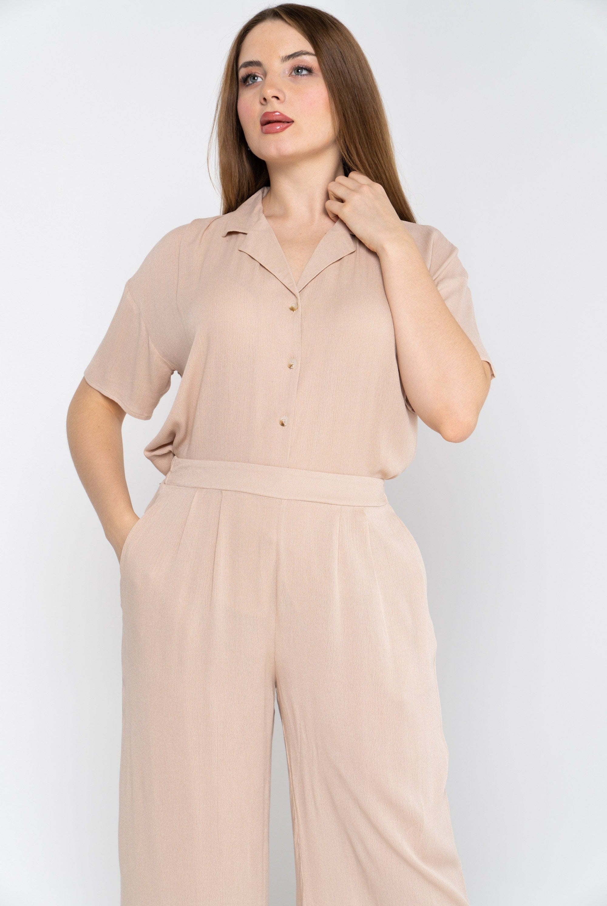 نتشي بلوزة سادة واسع نص كم نسائي