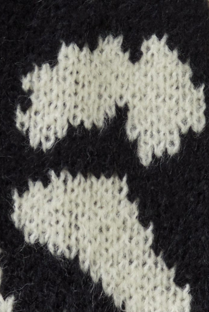 يونايتد كولورز اوف بينيتون قبعة أطفال بنقشة حيوانية من مزيج الصوف