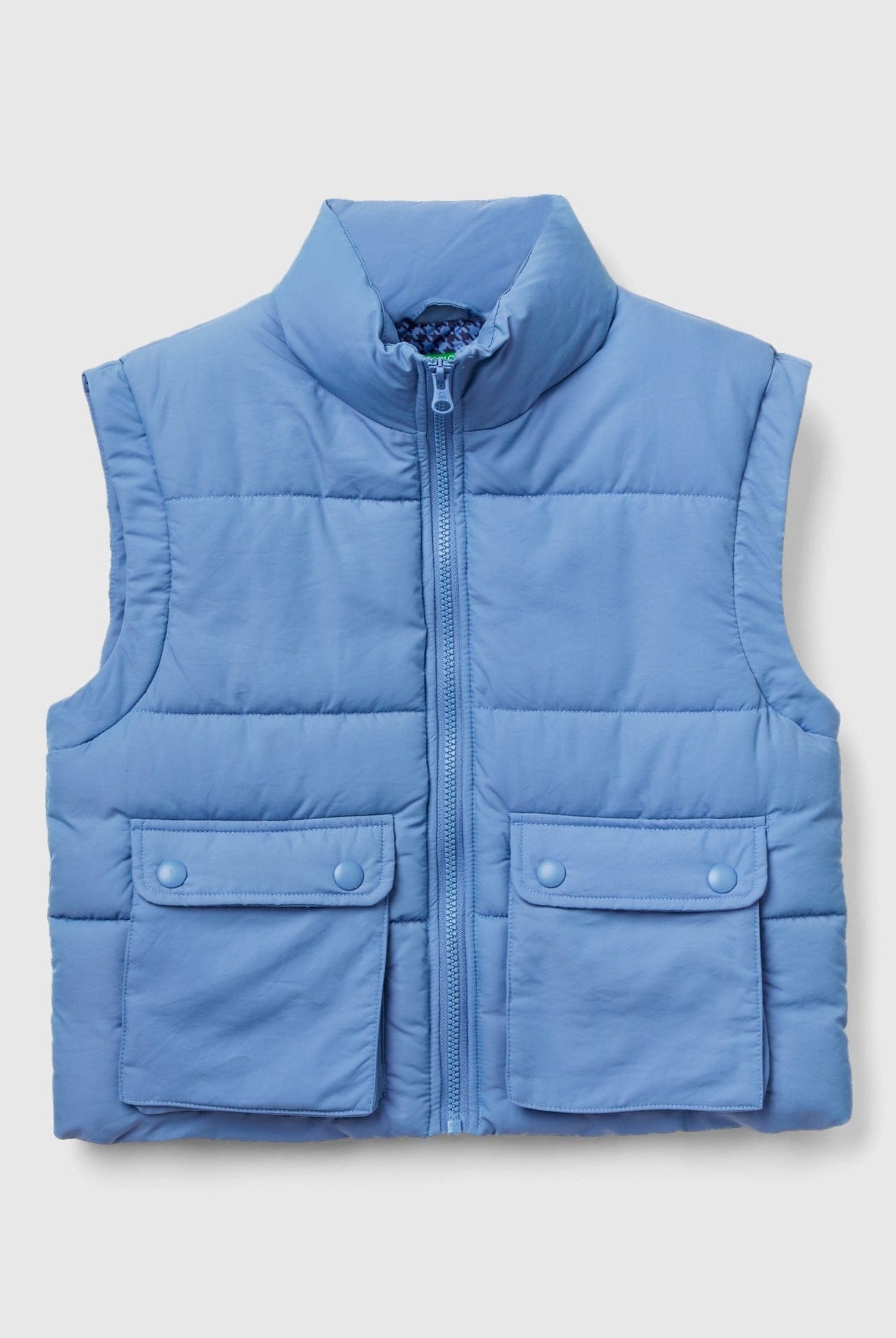 يونايتد كولورز اوف بينيتون سترة اطفال ضد المطر مبطنة بجيوب بدون اكمام