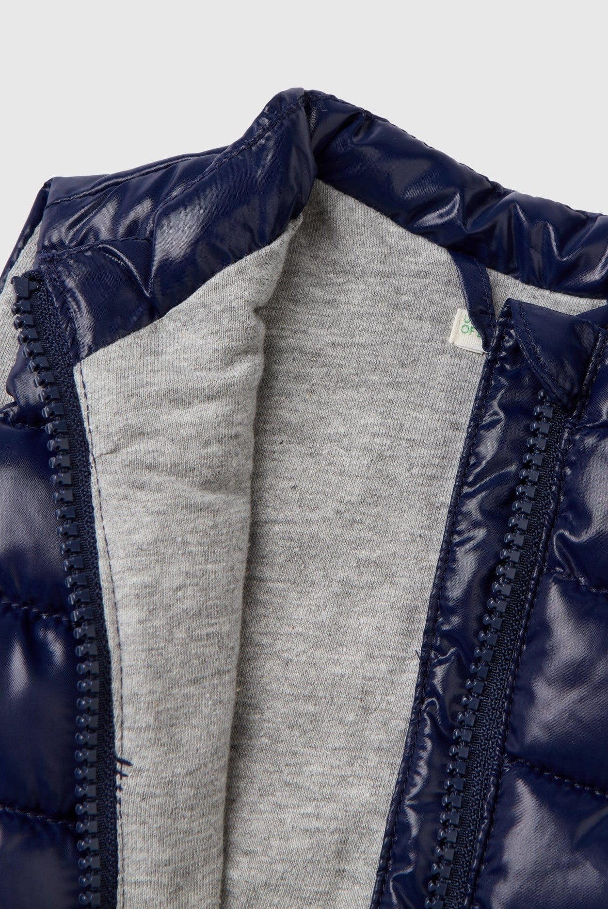 يونايتد كولورز اوف بينيتون جاكيت بمب بسحاب كت بيبي سادة