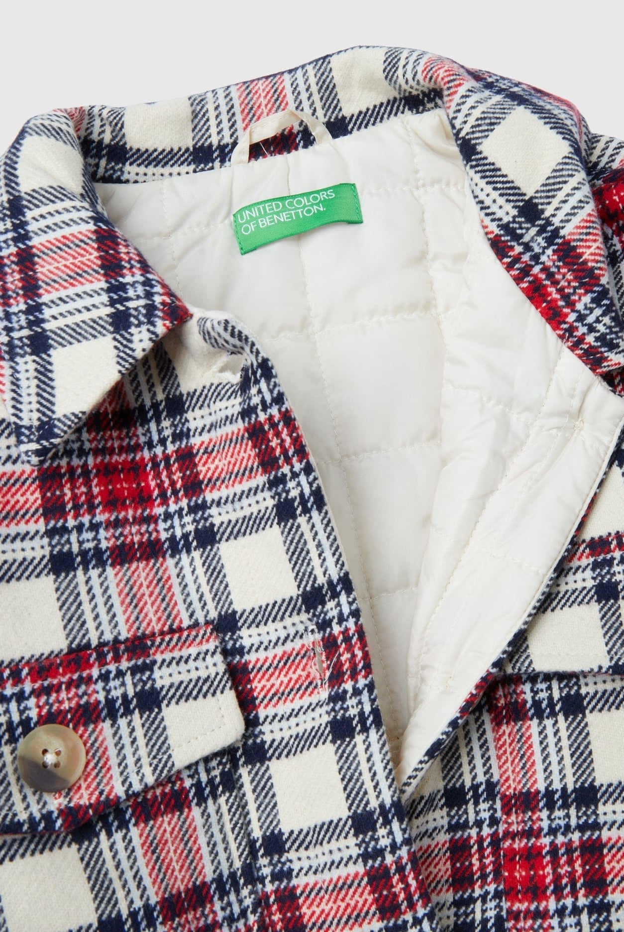 يونايتد كولورز اوف بينيتون قميص بناتي منقوش بتفاصيل كشكشة وجيوب أمامية