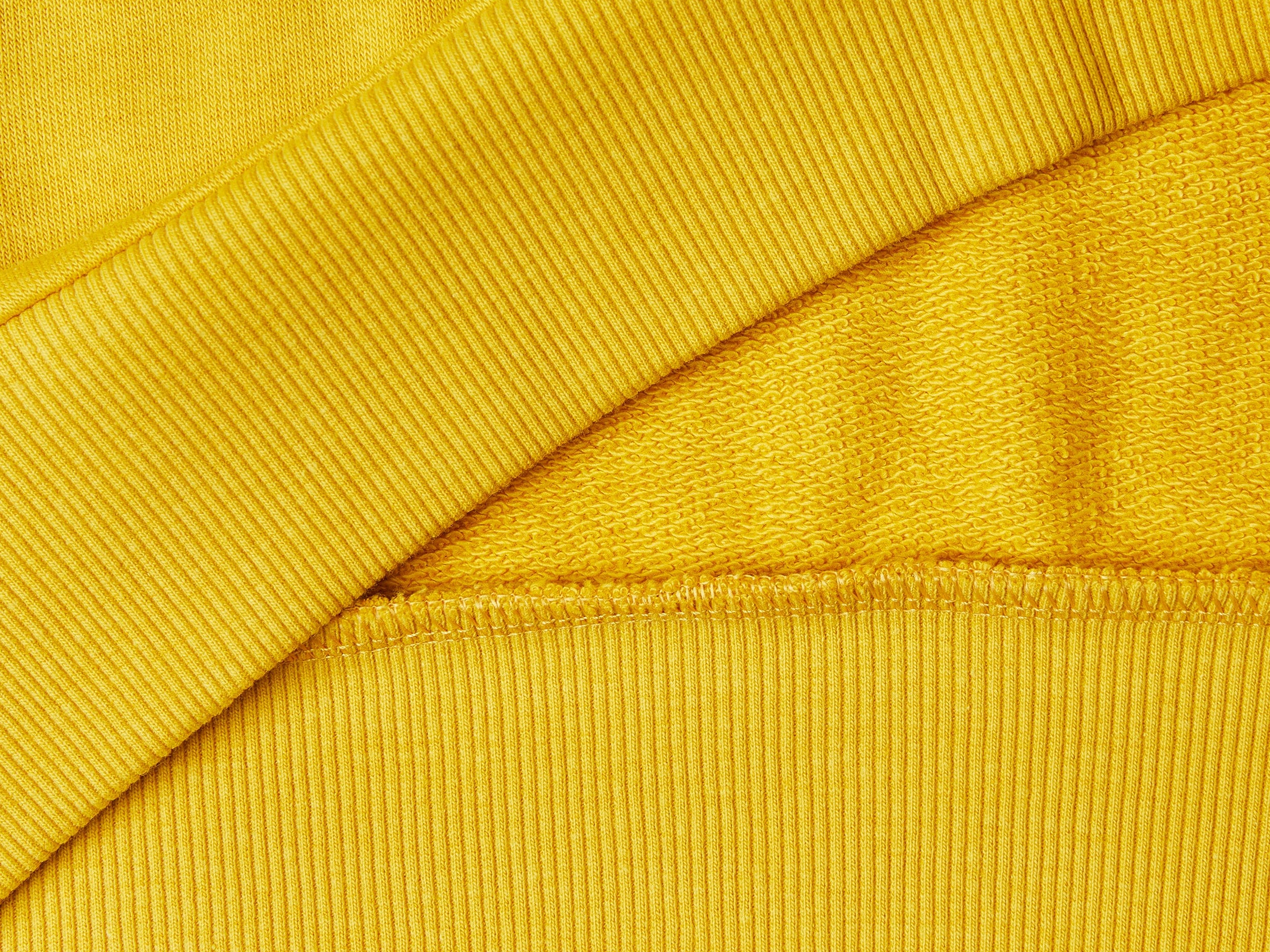 يونايتد كولورز اوف بينيتون سترة مطبوعة باللون الأصفر كم طويل ولادي