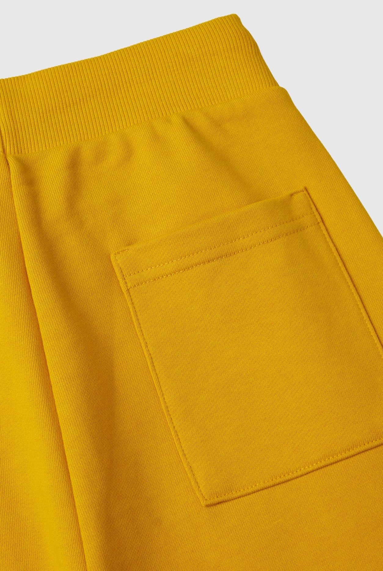 يونايتد كولورز اوف بينيتون بنطلون اطفالي رياضي وردي وأحمر برباط عالخصر