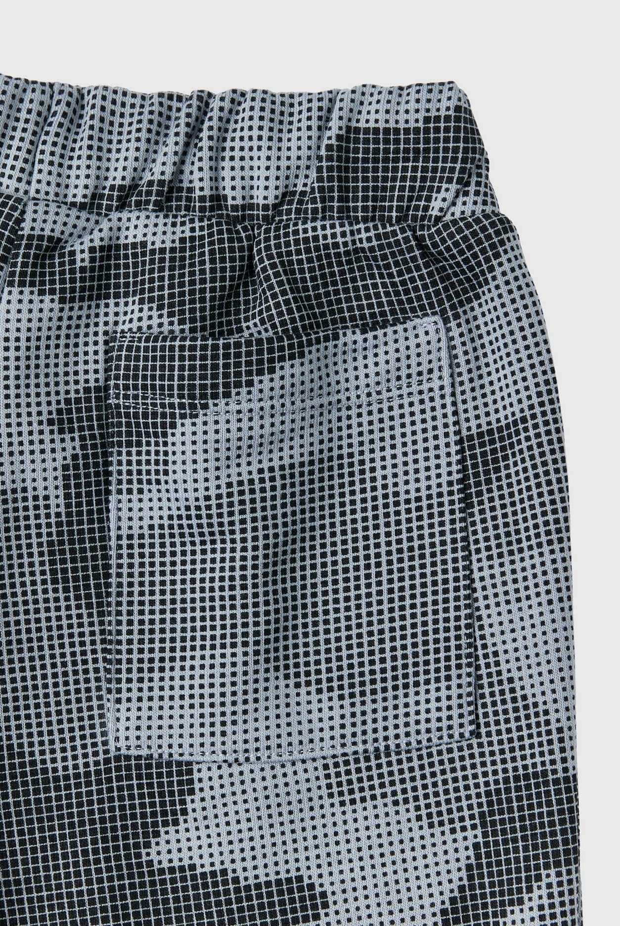 يونايتد كولورز اوف بينيتون بنطلون رياضي بنقشة مموهة برباط أولادي