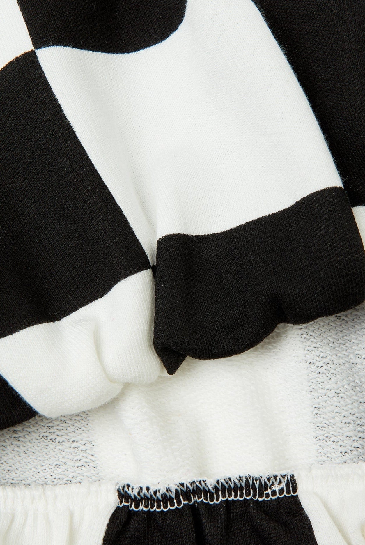 يونايتد كولورز اوف بينيتون سترة مربعات بناتي كم طويل