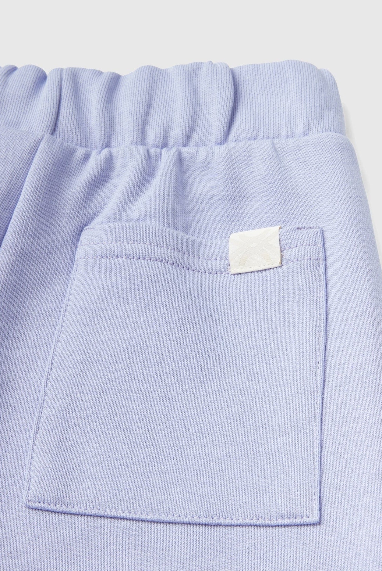 يونايتد كولورز اوف بينيتون بدلة رياضية بشعار كم طويل أطفالي