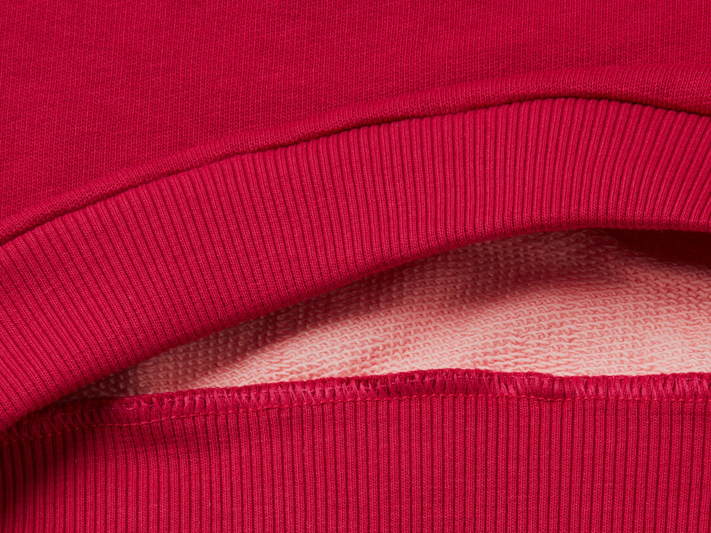 يونايتد كولورز اوف بينيتون سويت شيرت بناتي وردي من القطن العضوي مع طباعة لامعة