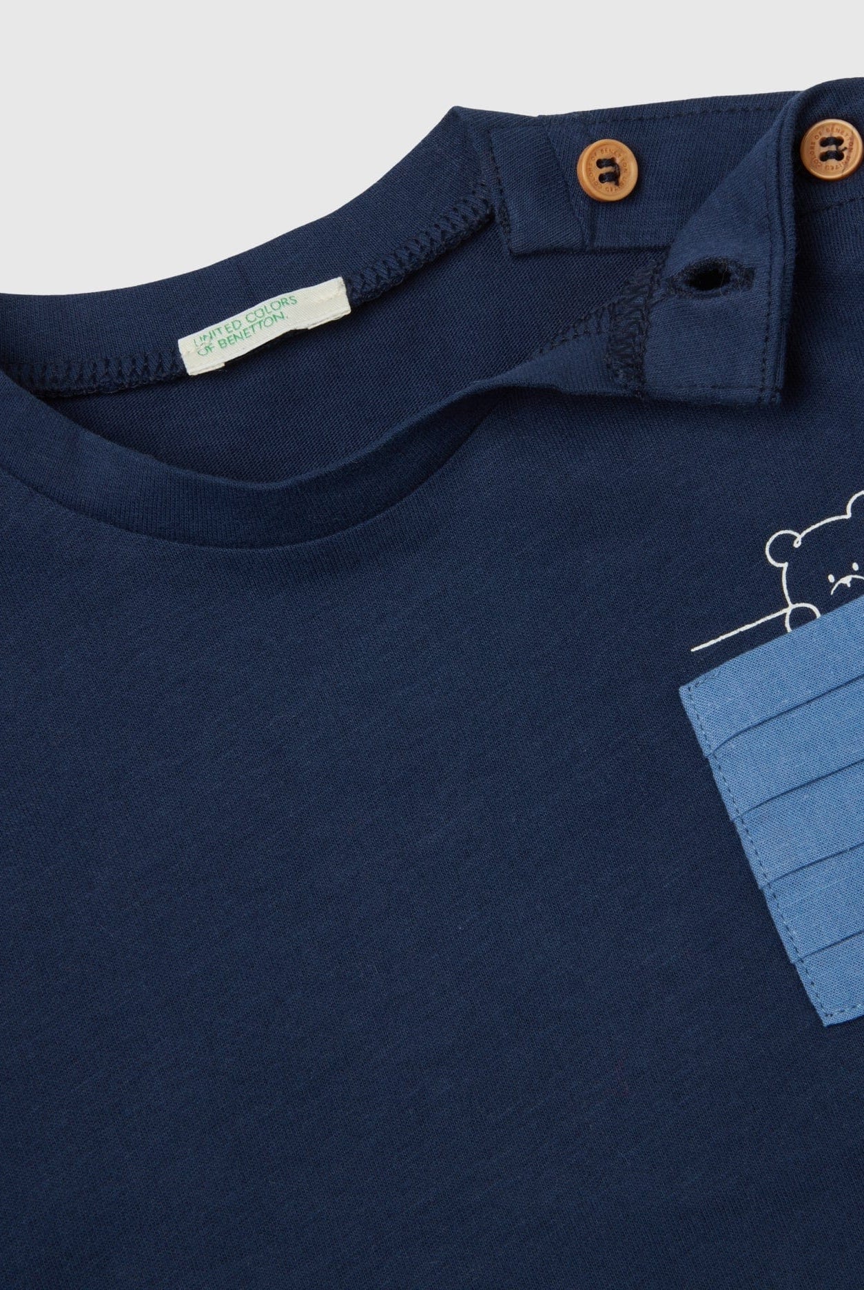 يونايتد كولورز اوف بينيتون تيشيرت بجيب مطوي كم طويل رضع أطفال