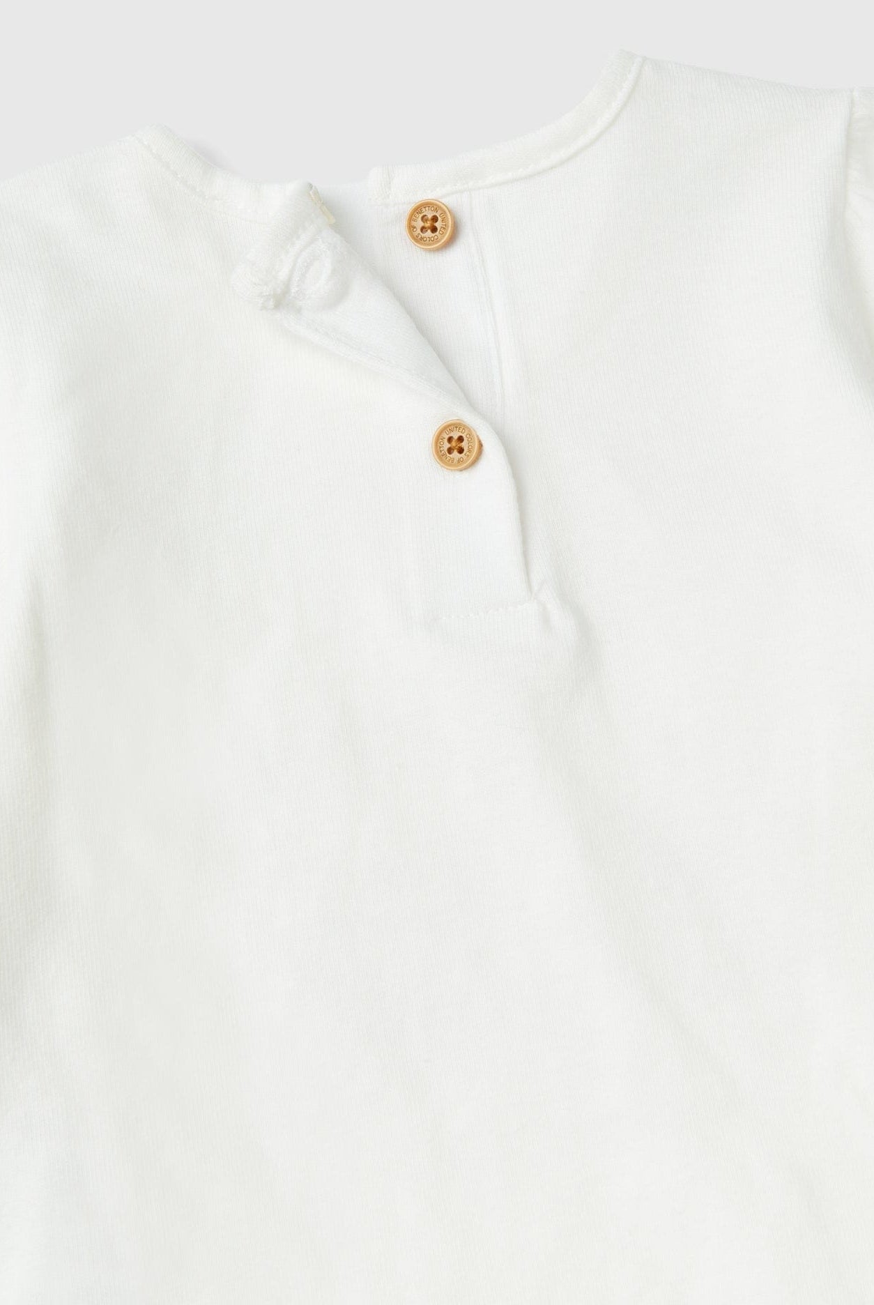 يونايتد كولورز اوف بينيتون طقم بنطلون منقوش وتيشيرت كم طويل رضع أطفال