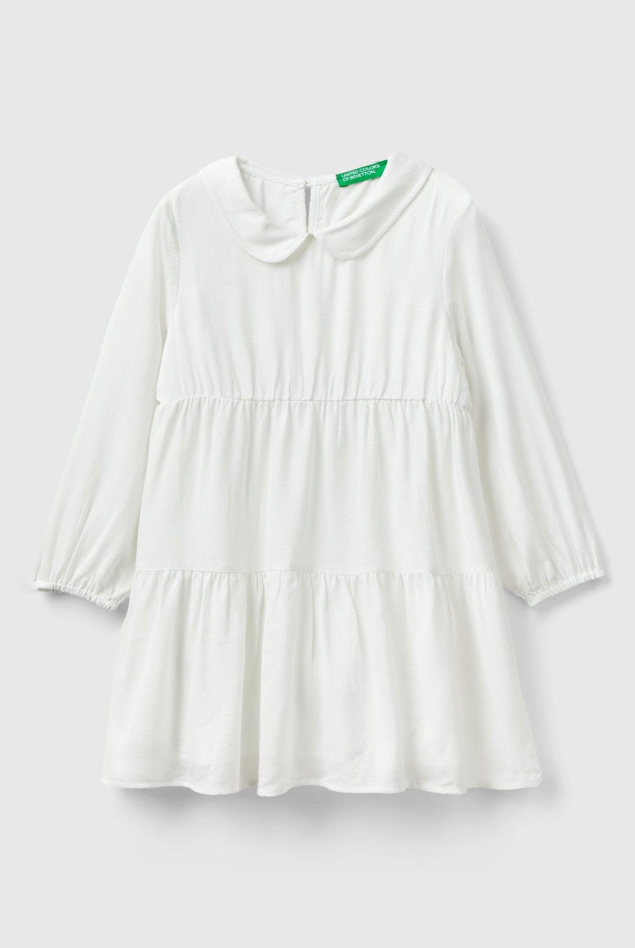 يونايتد كولورز اوف بينيتون فستان بناتي قصير بخيوط لامعة وياقة