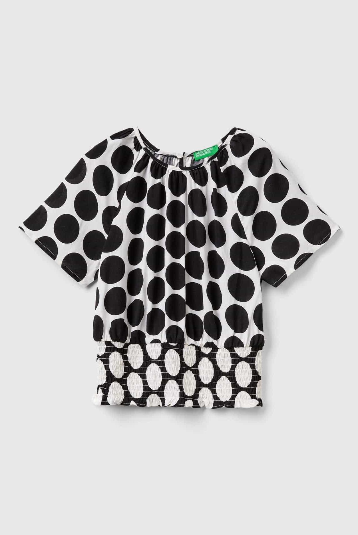 يونايتد كولورز اوف بينيتون بلوزة بناتي بنقاط منقطة واسعة