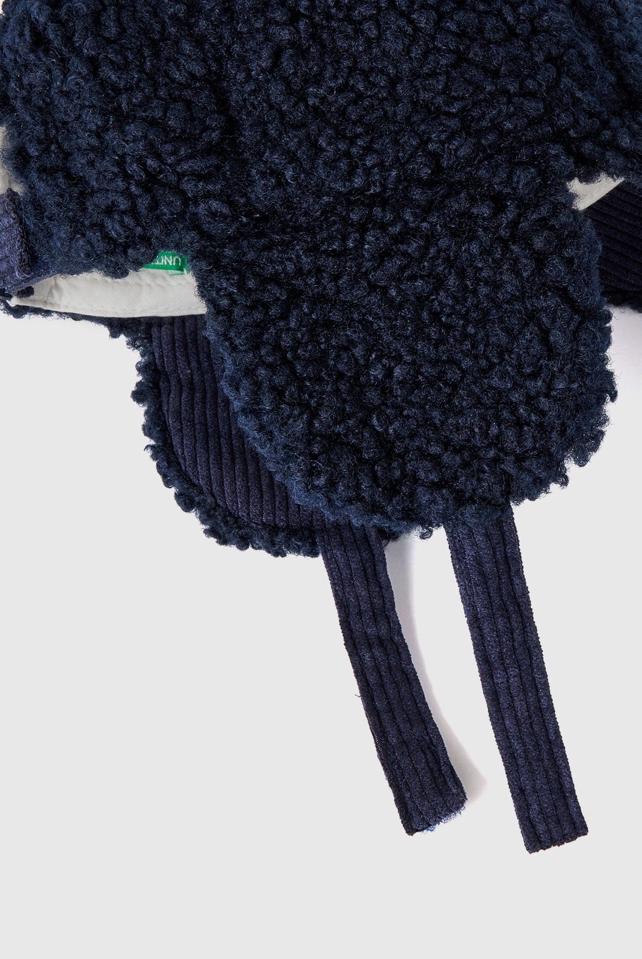 يونايتد كولورز اوف بينيتون قبعة صوف بأغطية للأذن رضع بناتي