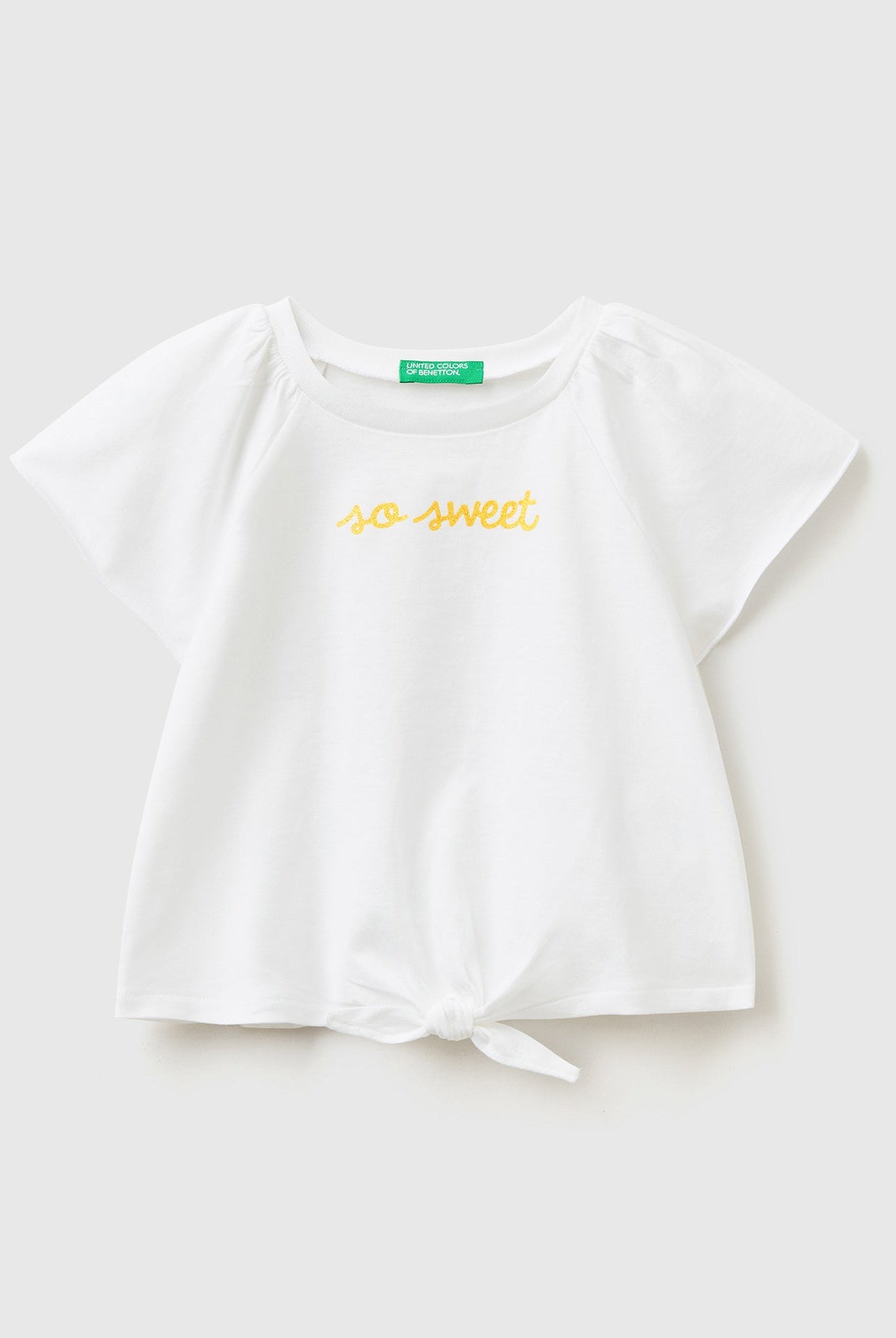 يونايتد كولورز اوف بينيتون تي شيرت بناتي نص كم مع عقدة وطبعة لامعة