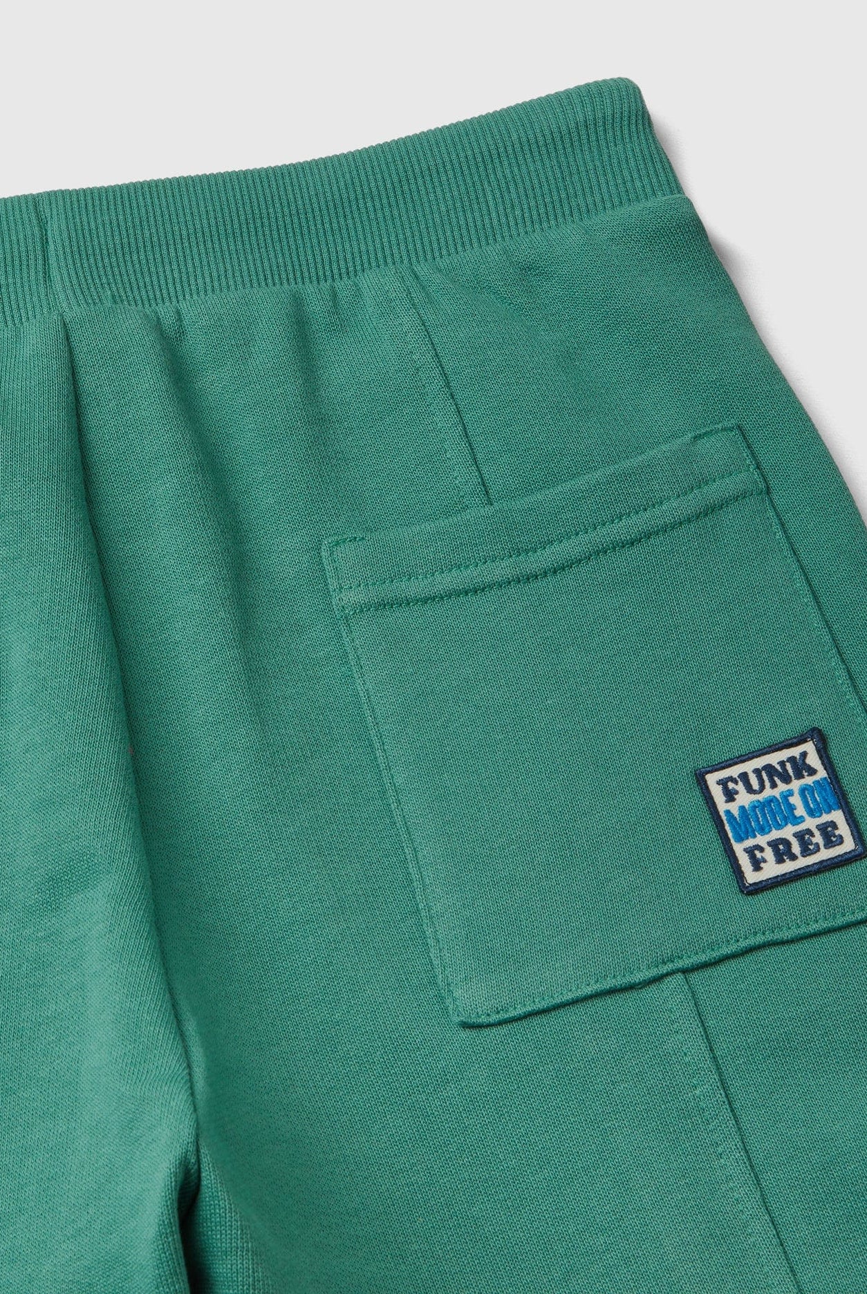 يونايتد كولورز اوف بينيتون بنطلون رياضي سادة ولادي برباط