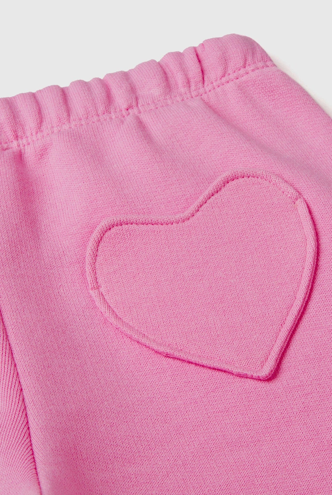 يونايتد كولورز اوف بينيتون سويت بانتس بجيب على شكل قلب برباط ملون بناتي