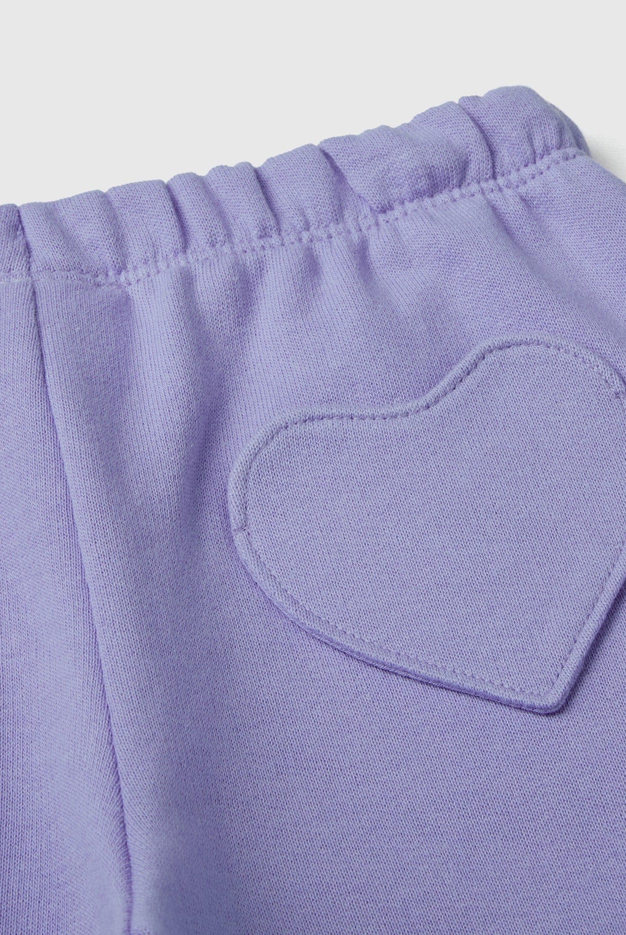 يونايتد كولورز اوف بينيتون سويت بانتس بجيب على شكل قلب برباط ملون بناتي