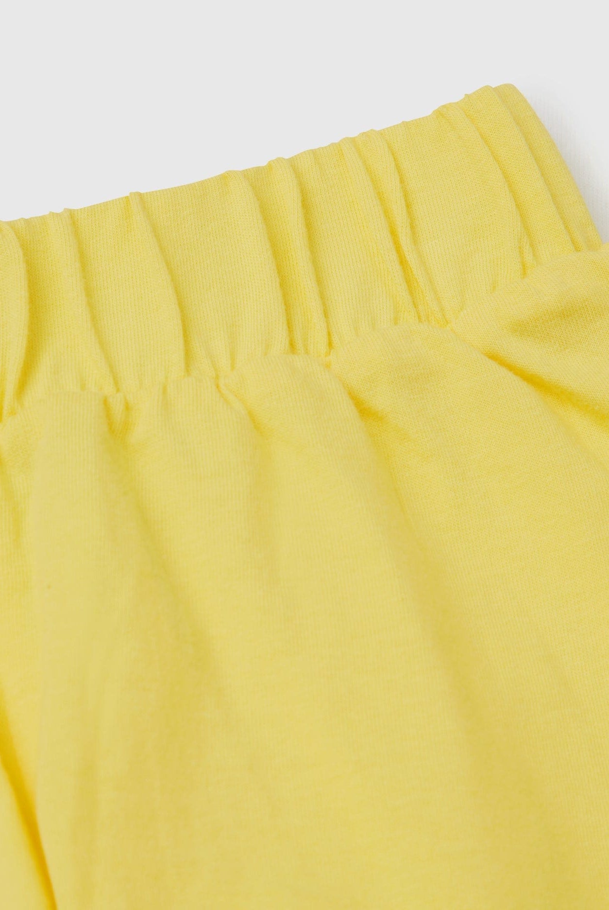 يونايتد كولورز اوف بينيتون تانك توب بدون أكمام وشورت مخطط بناتي