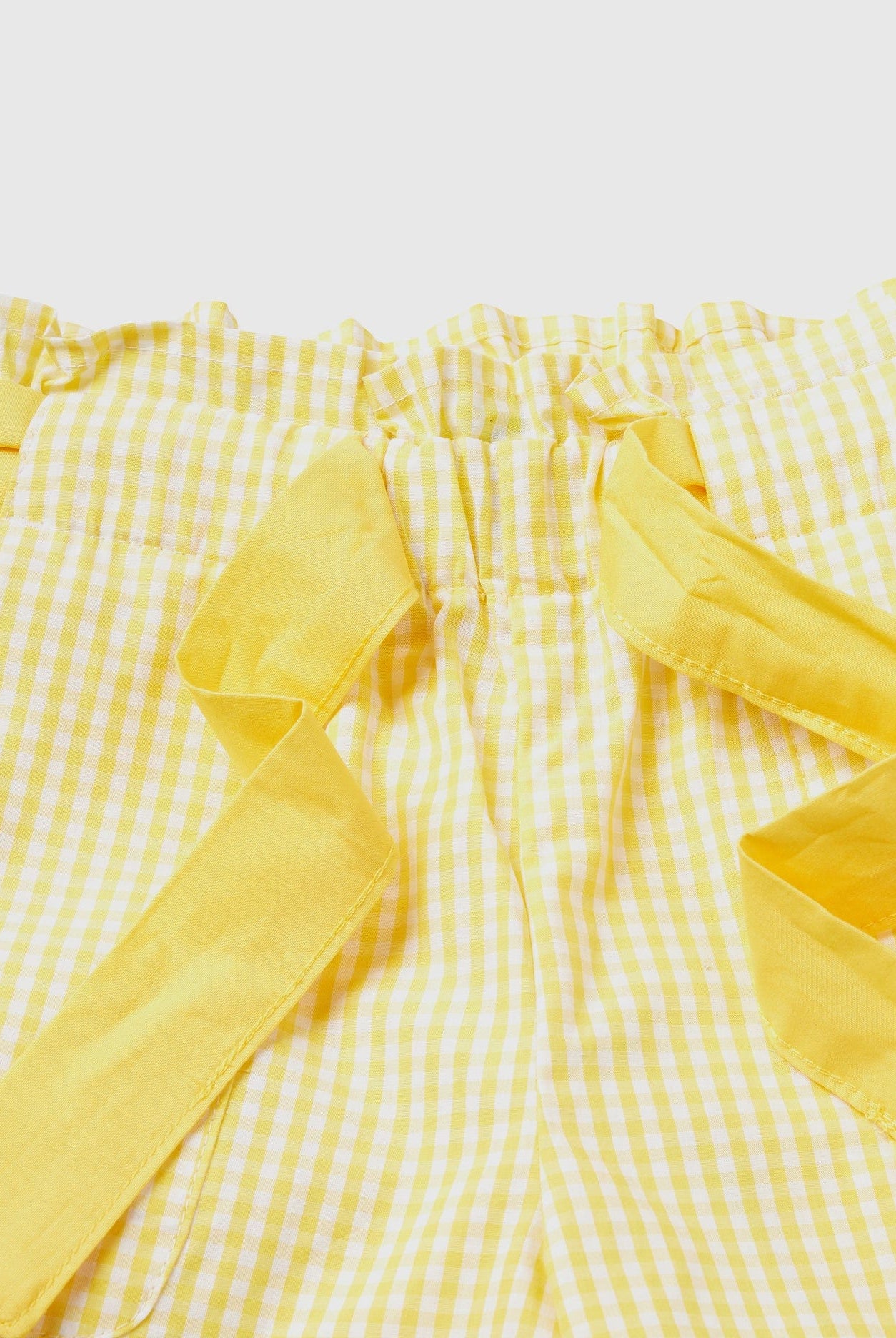 يونايتد كولورز اوف بينيتون بيرمودا فيشي مع حزام ستان بناتي