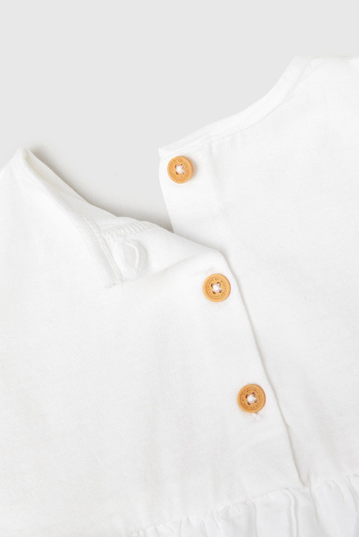 يونايتد كولورز اوف بينيتون فستان رضع بتطريز برودري أنجليزي