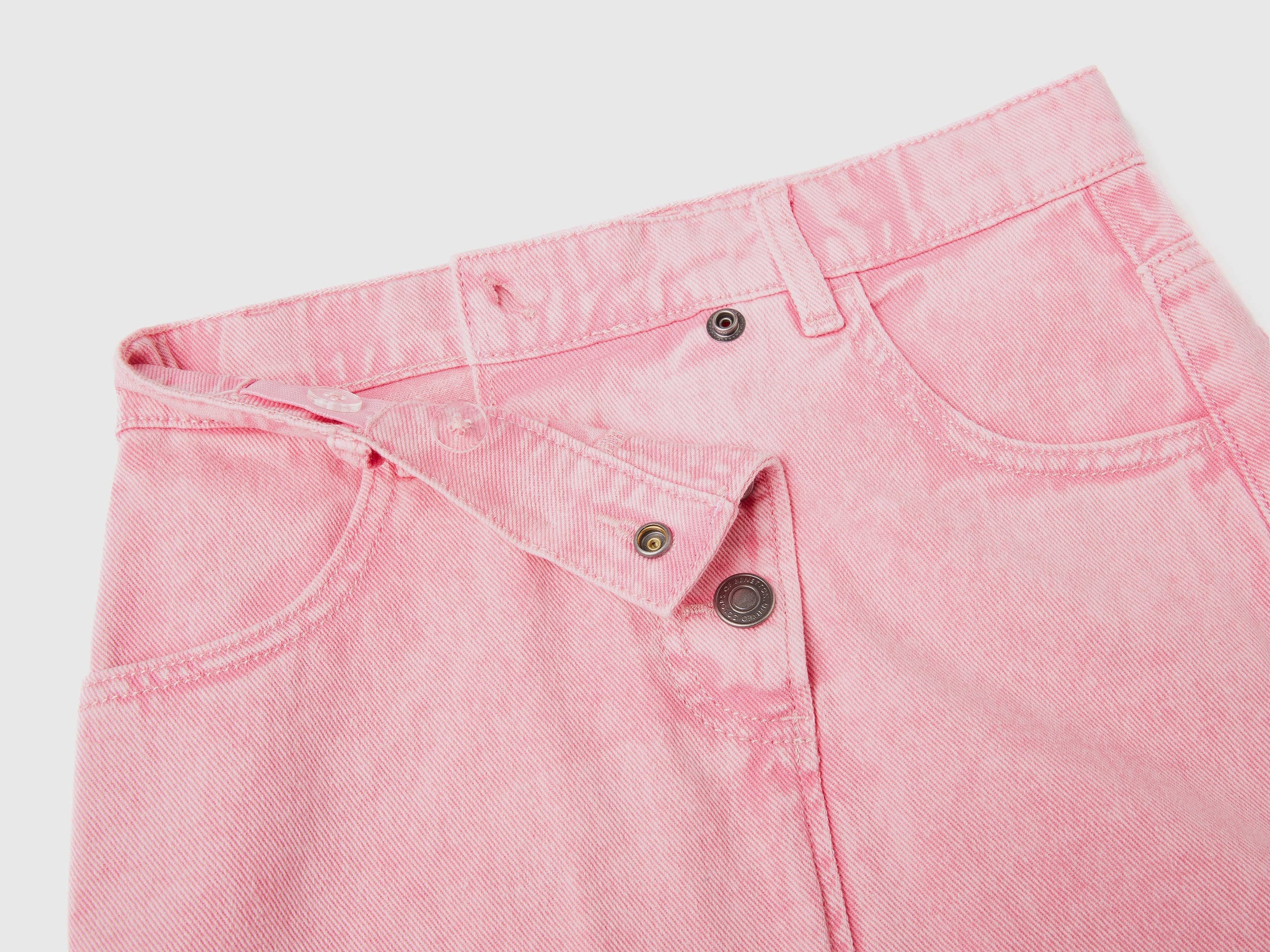 يونايتد كولورز اوف بينيتون تنورة بناتي قصيرة بأزرار وجيوب