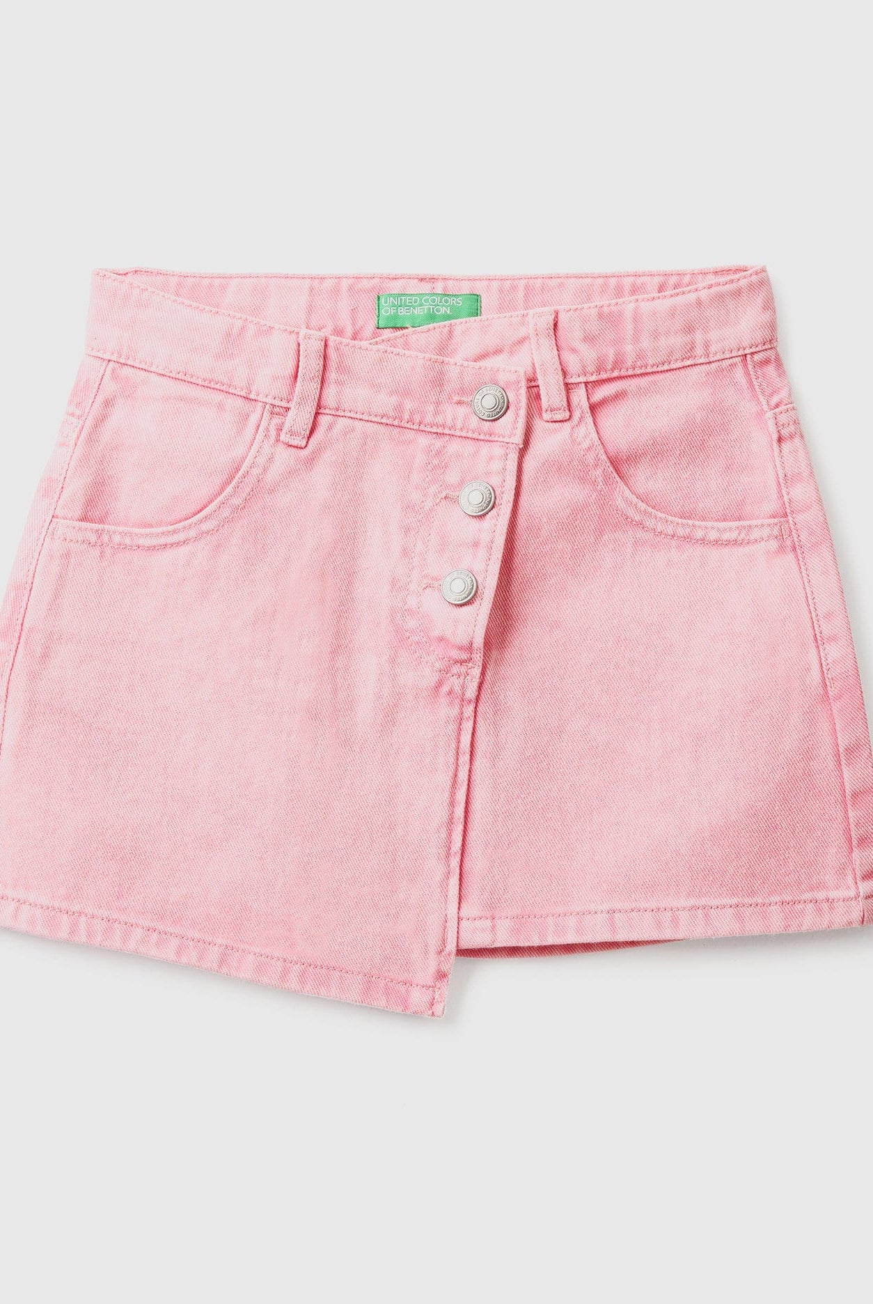 يونايتد كولورز اوف بينيتون تنورة بناتي قصيرة بأزرار وجيوب