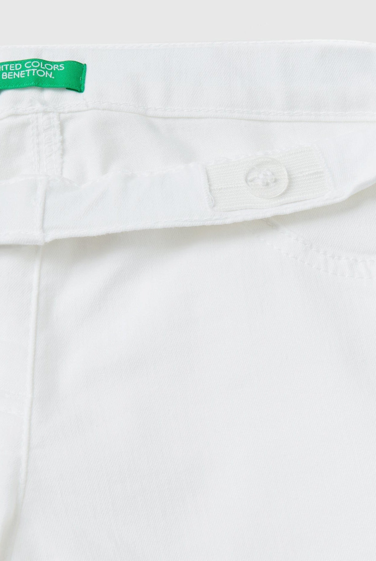 يونايتد كولورز اوف بينيتون بنطلون بناتي سكيني سادة بزرار أمامي