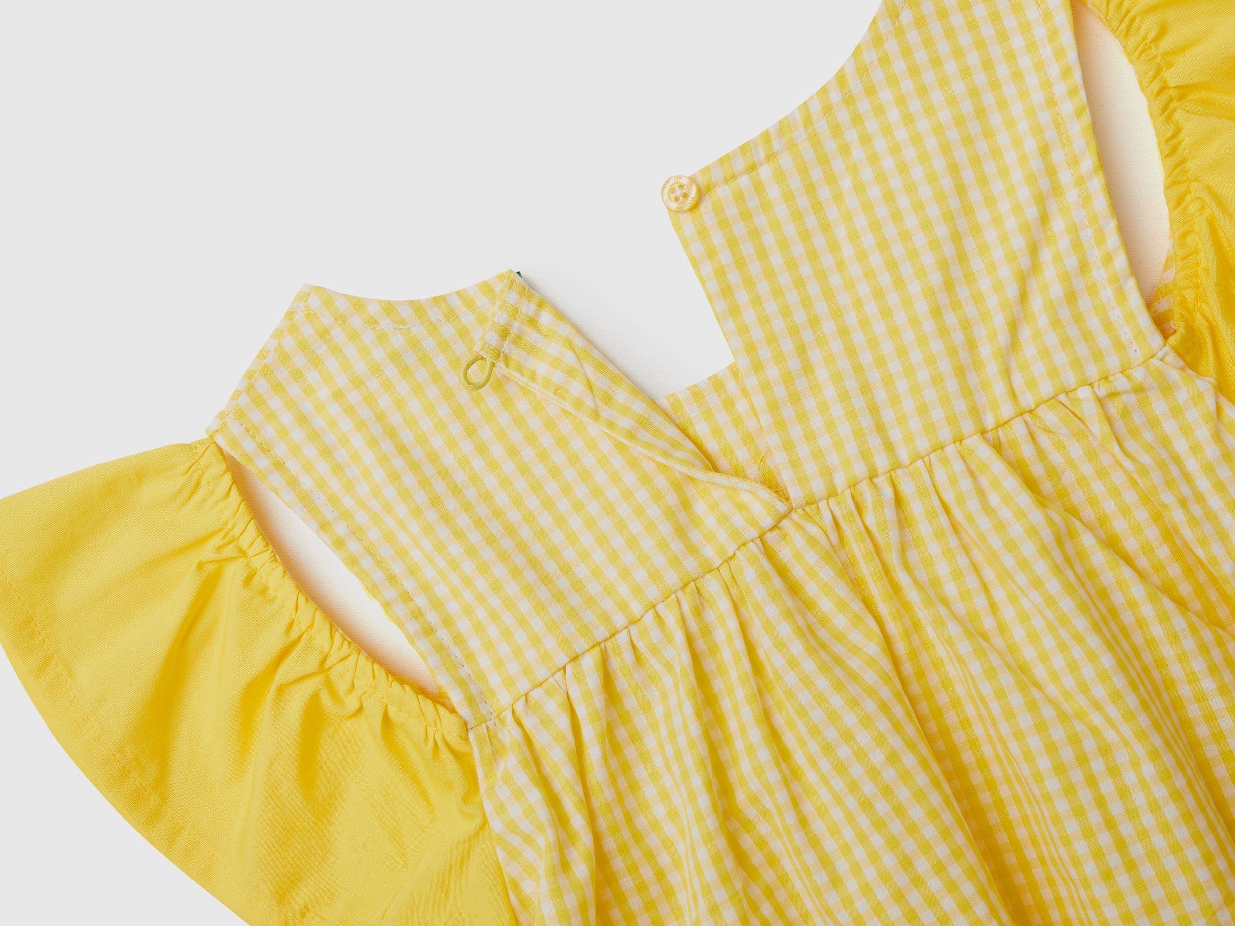 يونايتد كولورز اوف بينيتون بلوزة فيشي بأكمام كشكش بناتي