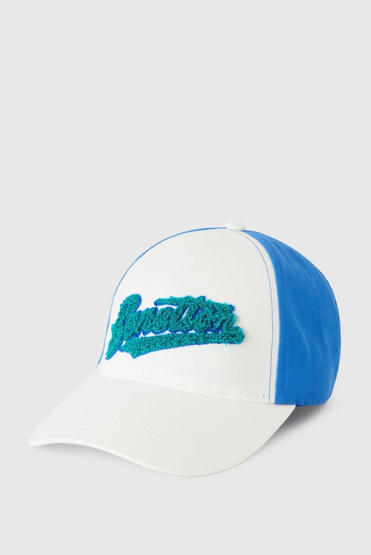 يونايتد كولورز اوف بينيتون قبعة ولادي بلونين مع طباعة