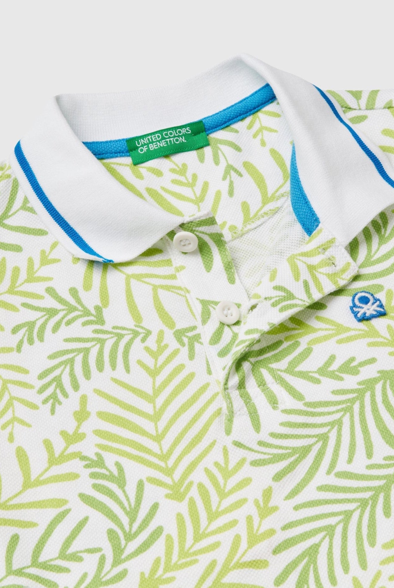 يونايتد كولورز اوف بينيتون تيشيرت بولو مطبوع بنقش مع شعار مطبوع على الصدر الأيسر للأولاد