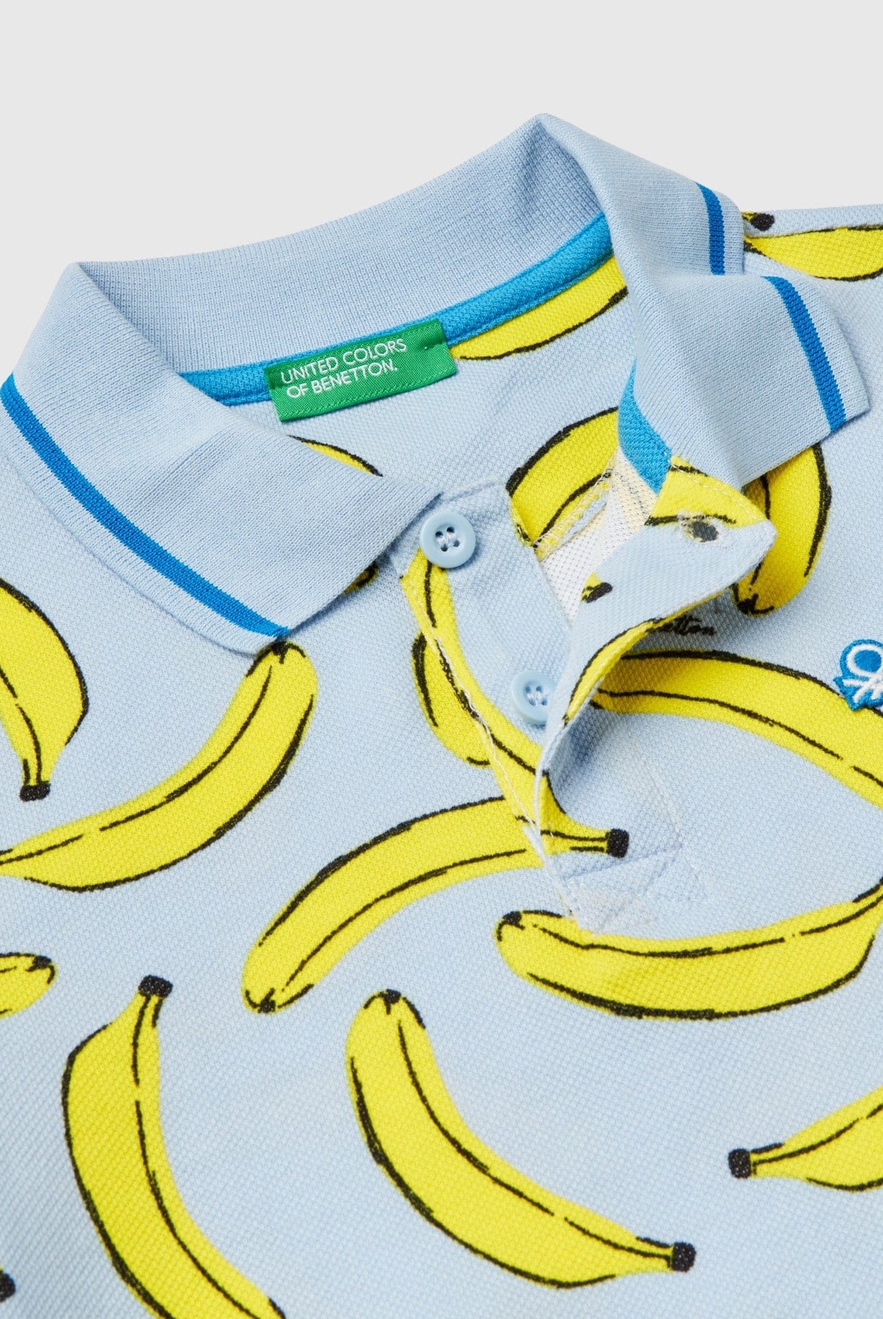 يونايتد كولورز اوف بينيتون تيشيرت بولو مطبوع بنقش مع شعار مطبوع على الصدر الأيسر للأولاد