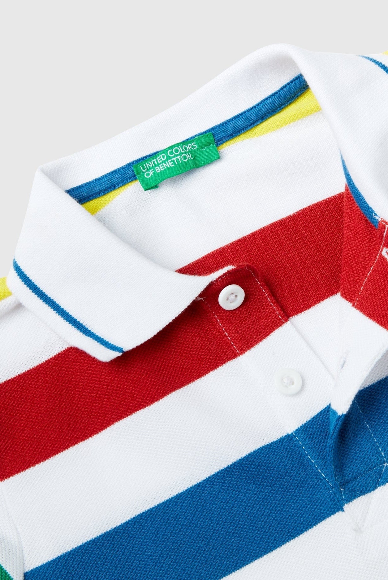 يونايتد كولورز اوف بينيتون قميص بولو بأكمام قصيرة وخطوط أطفالي