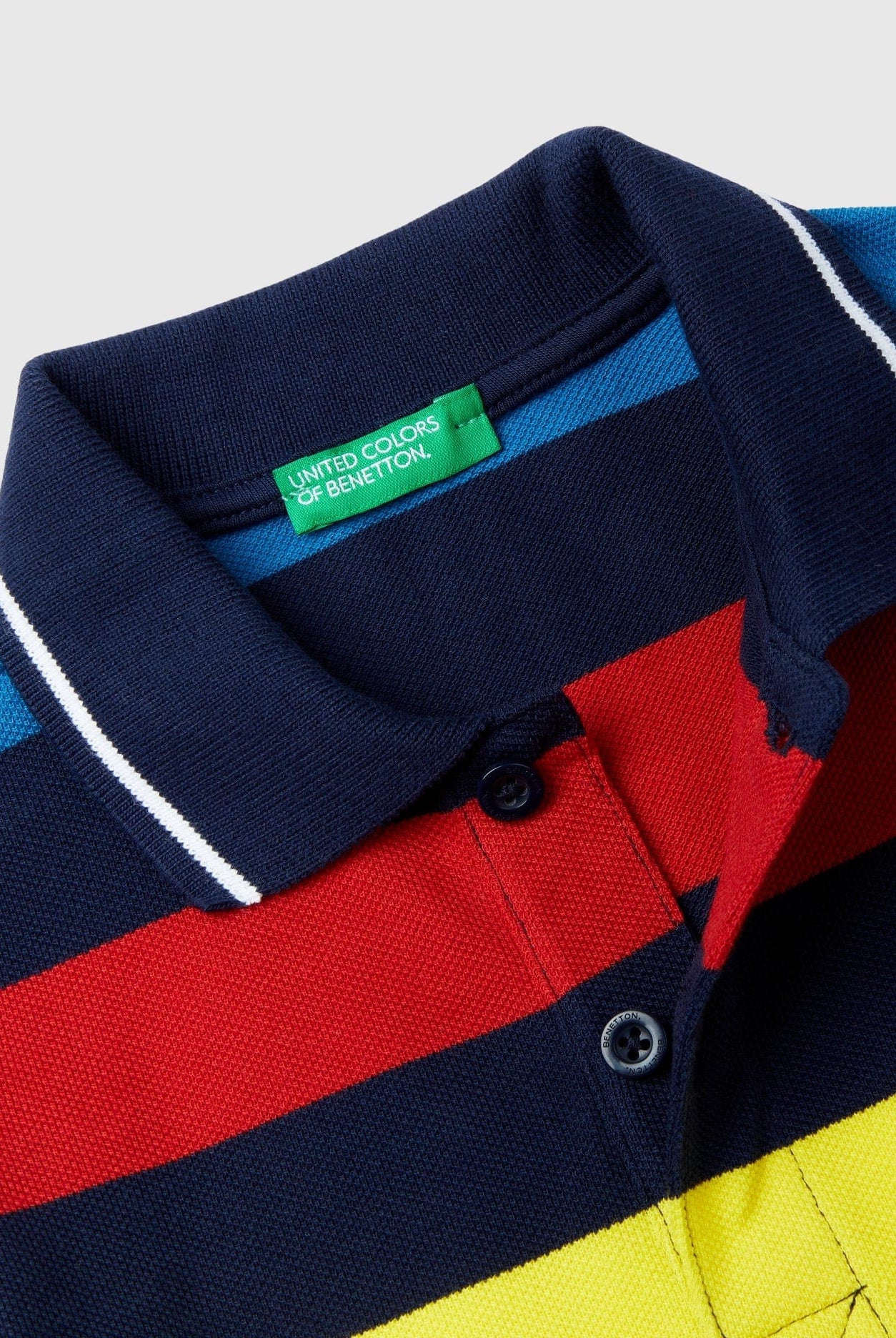 يونايتد كولورز اوف بينيتون قميص بولو بأكمام قصيرة وخطوط أطفالي