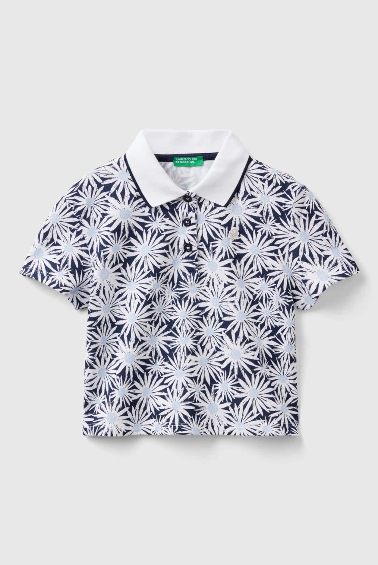 خصومات يونايتد كولورز اوف بينيتون تي شيرت برقبة بولو منقوش بالكامل بشعار لامع ومطرز أطفالي