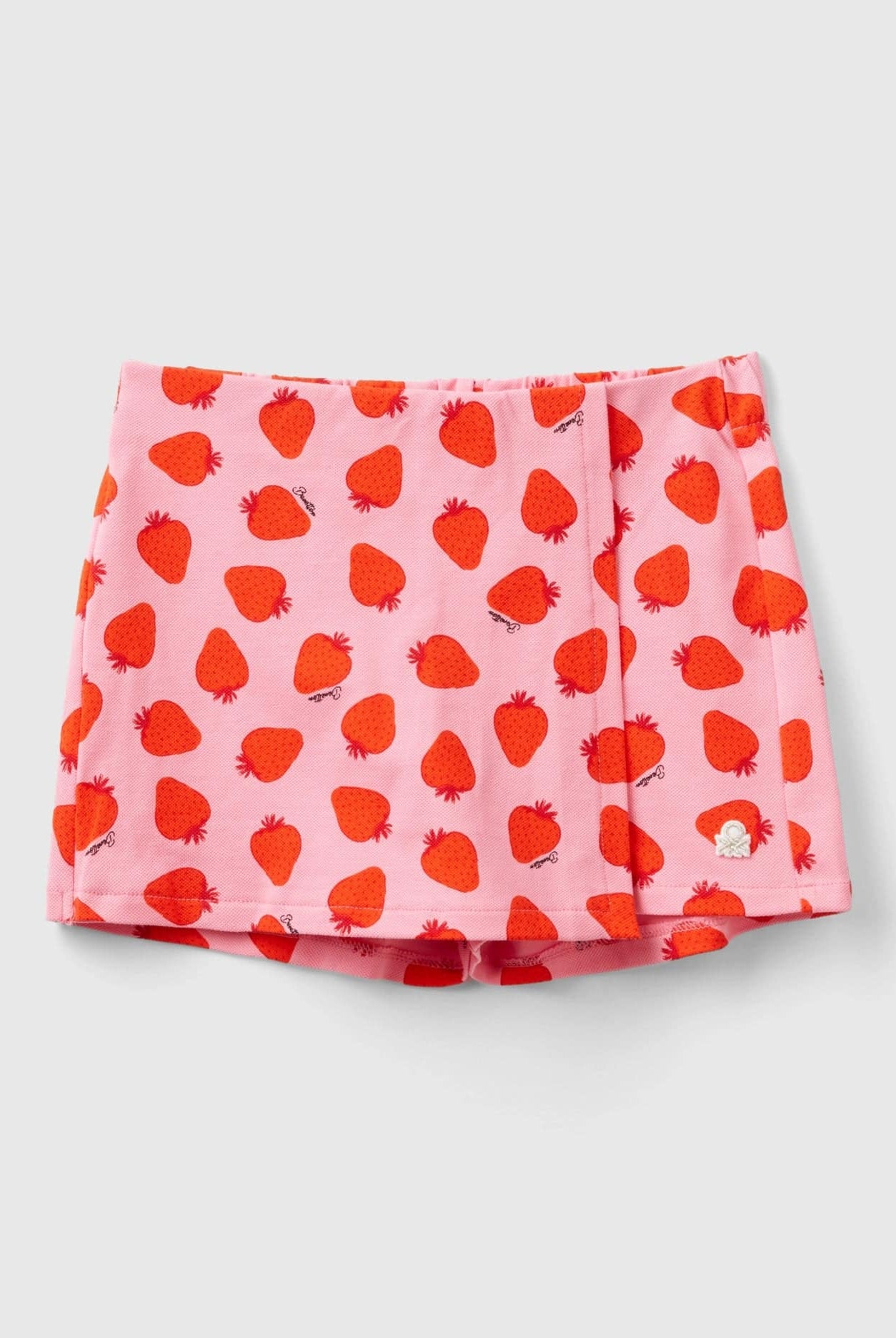 يونايتد كولورز اوف بينيتون تنورة قصيرة منقوشة بالكامل مطرزة بشعار لامع وبخصر مجمع للفتيات