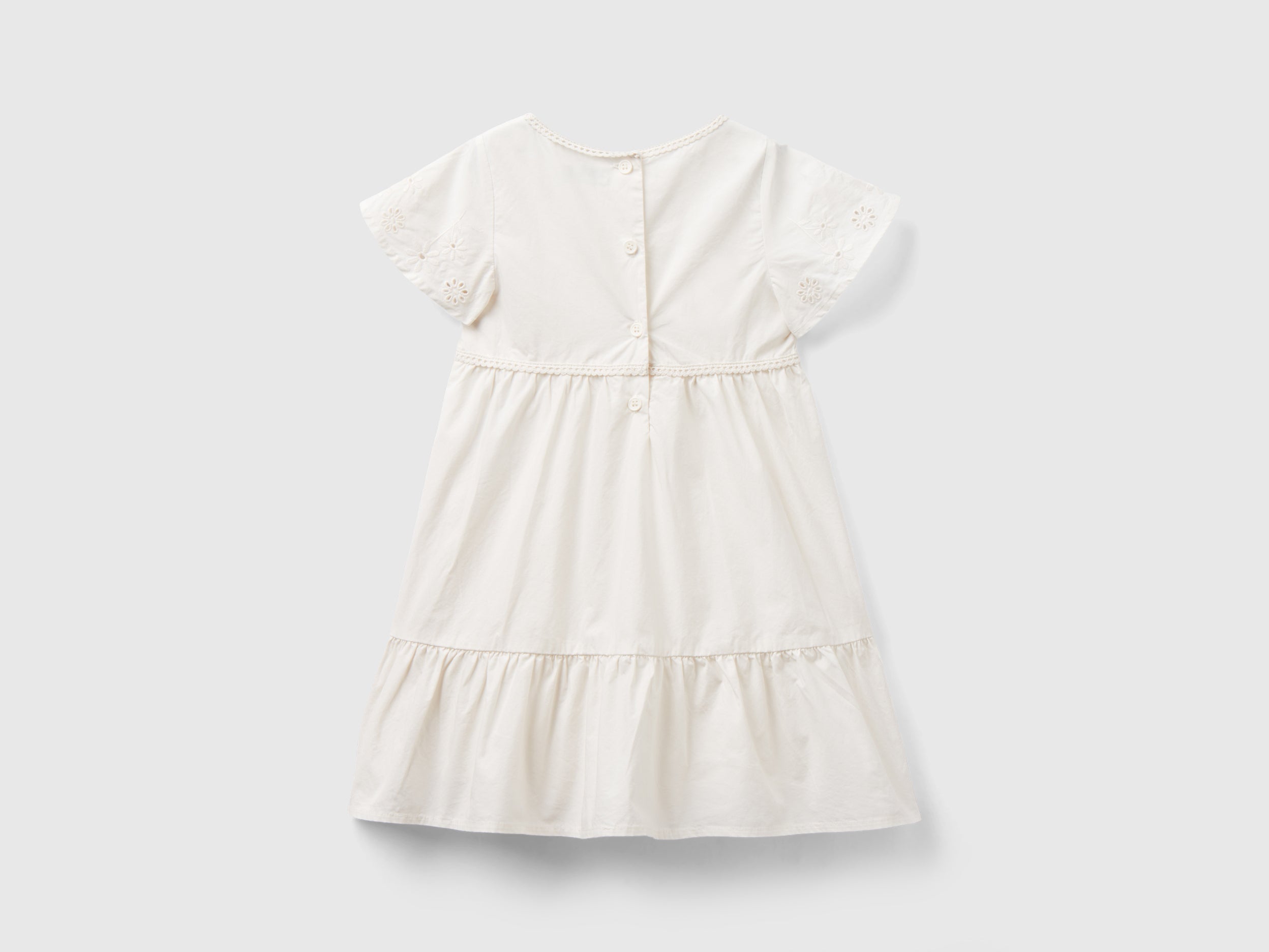 يونايتد كولورز اوف بينيتون فستان بناتي ياقة دائرية بتصميم زهور على الأكمام وأزرار في الخلف