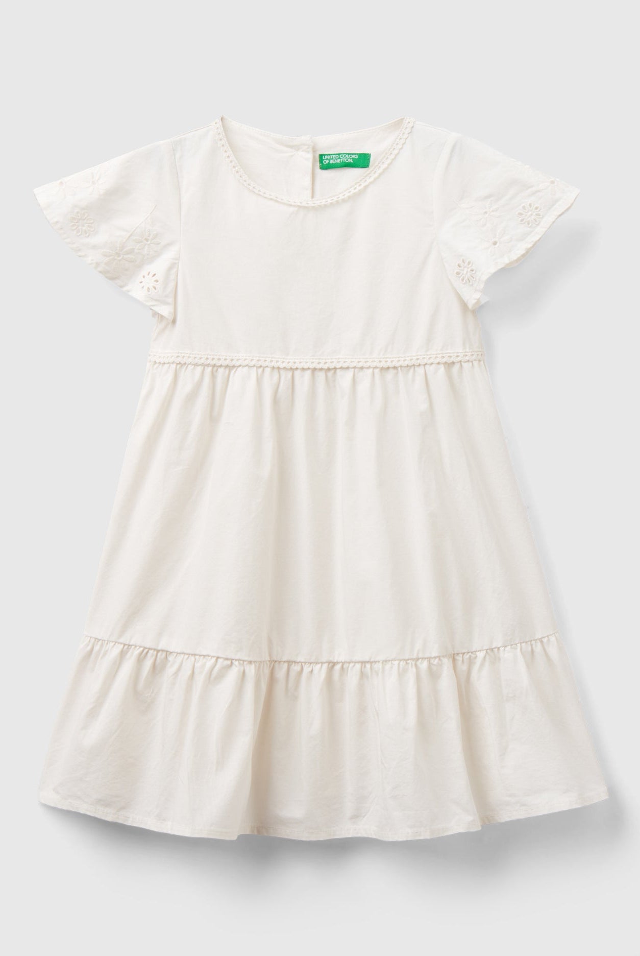 يونايتد كولورز اوف بينيتون فستان بناتي ياقة دائرية بتصميم زهور على الأكمام وأزرار في الخلف
