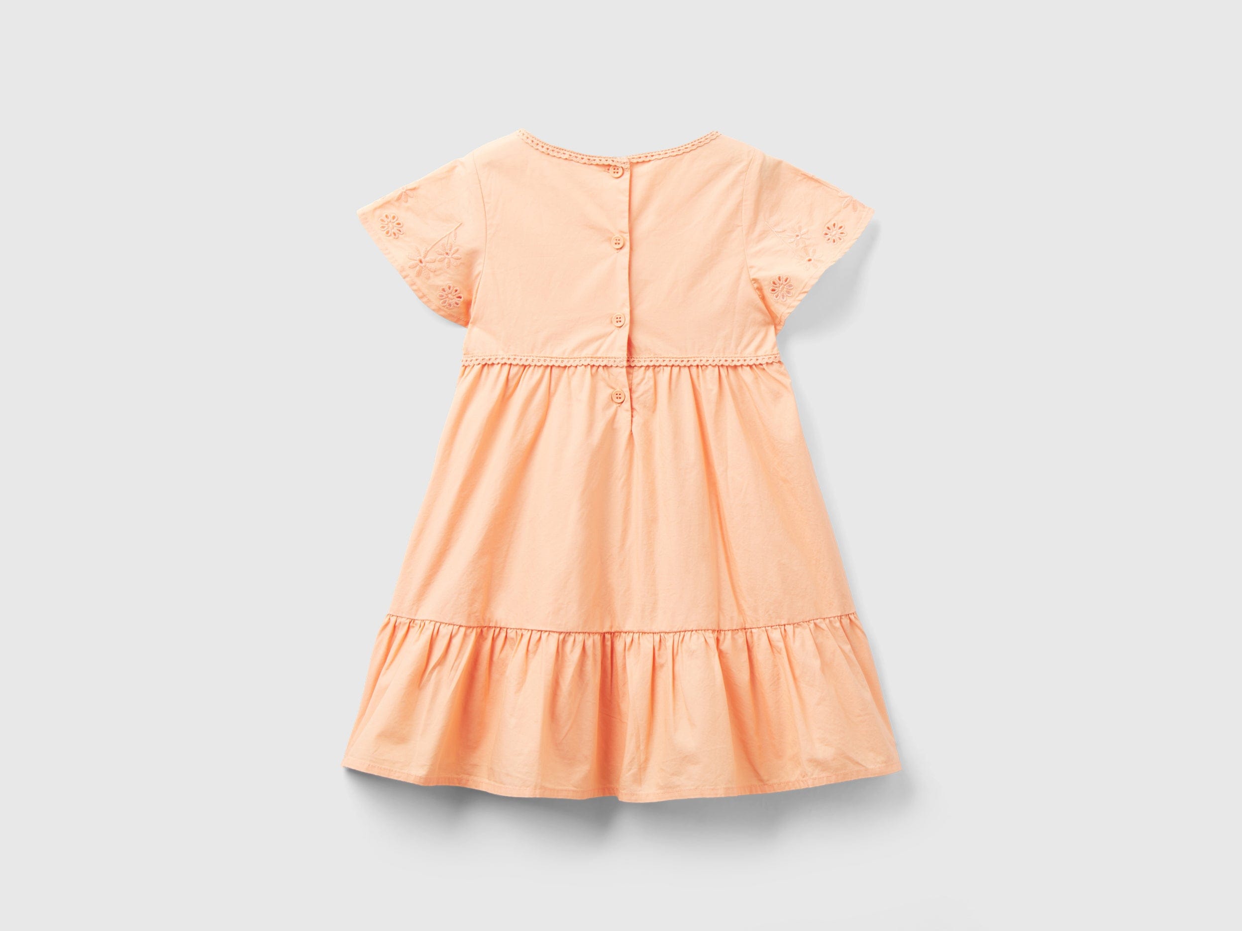 يونايتد كولورز اوف بينيتون فستان بناتي ياقة دائرية بتصميم زهور على الأكمام وأزرار في الخلف