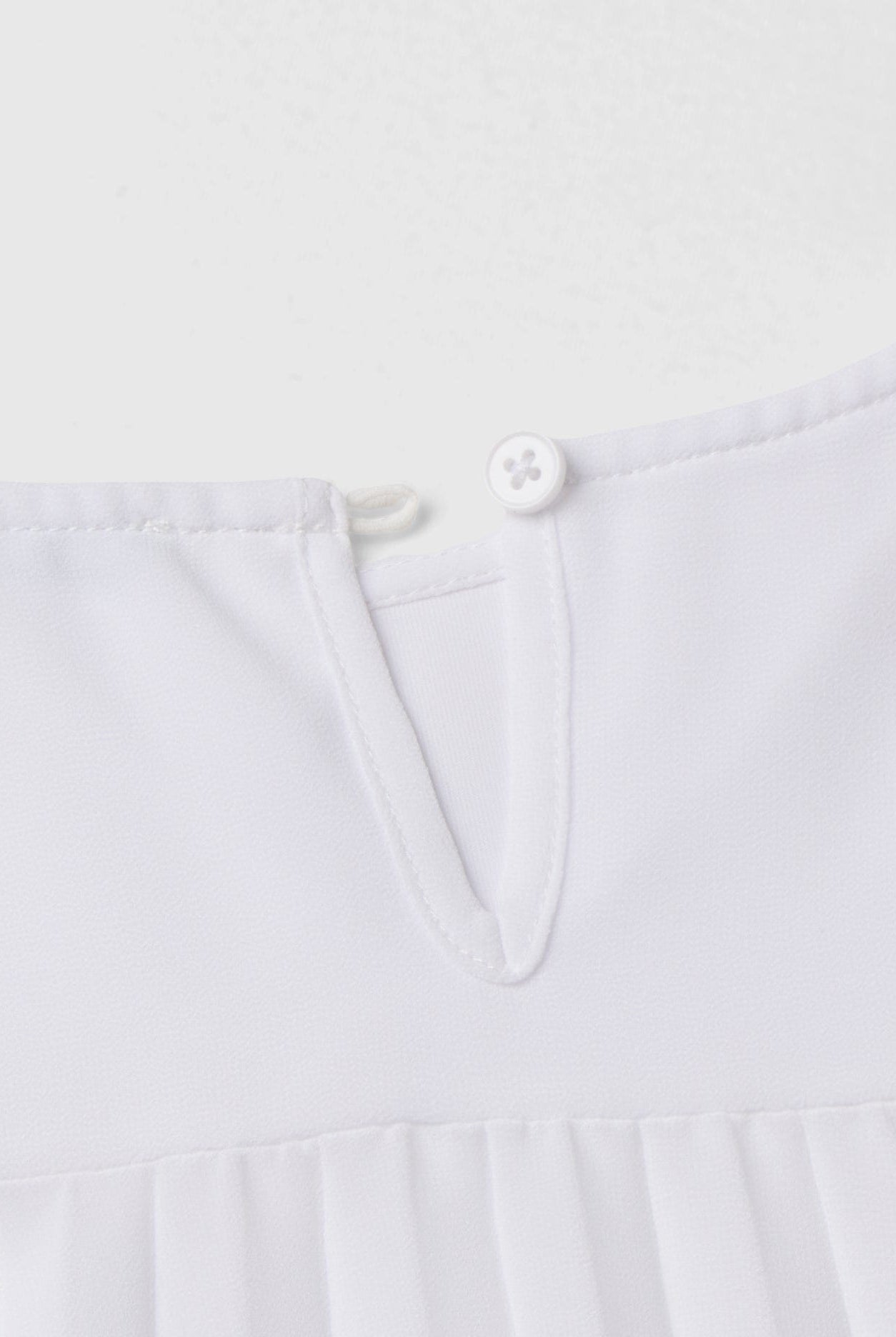 يونايتد كولورز اوف بينيتون بلوزة بتفاصيل مطوية أطفالي