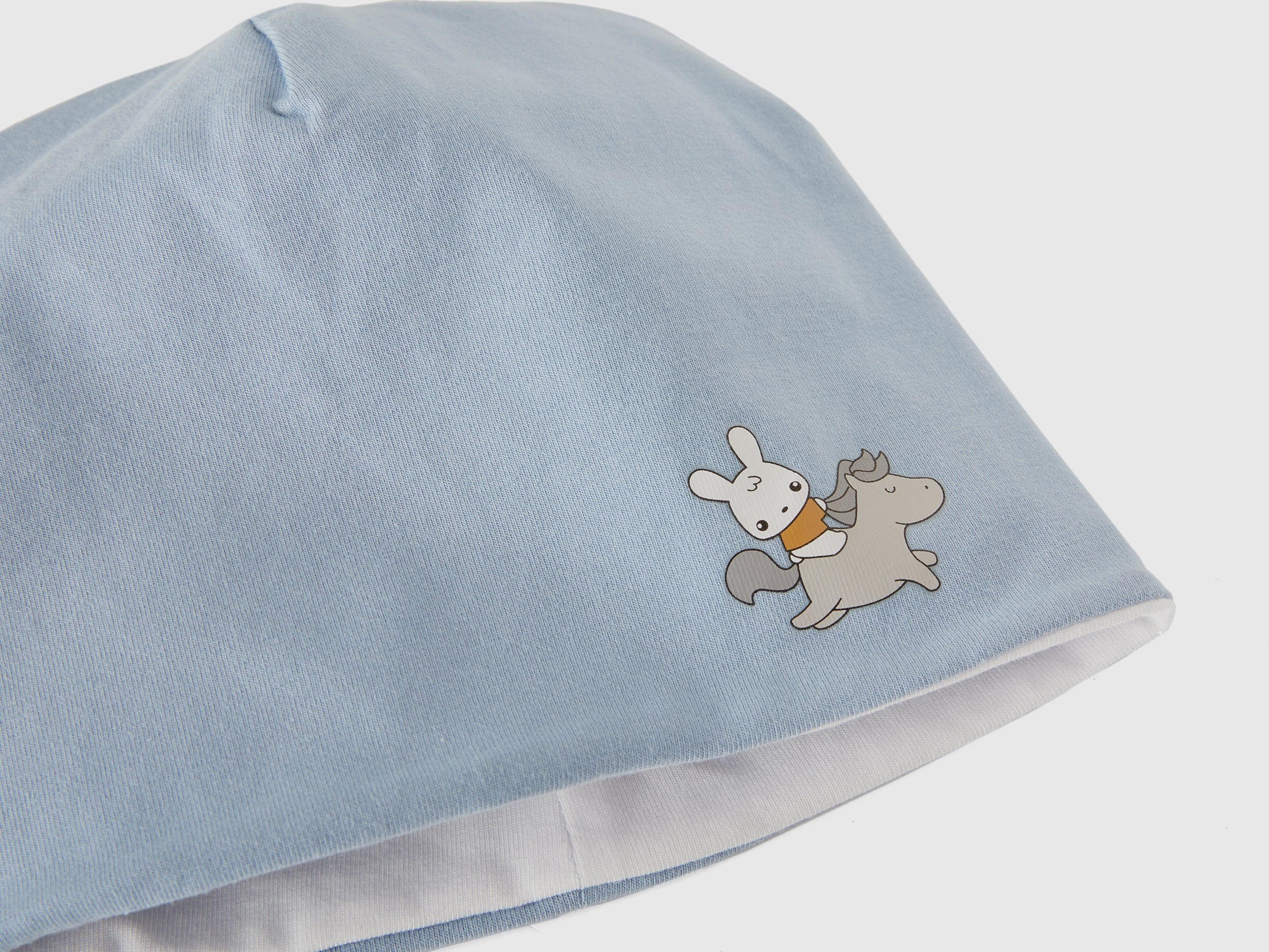 يونايتد كولورز اوف بينيتون قبعة قطن بطبعة رضع