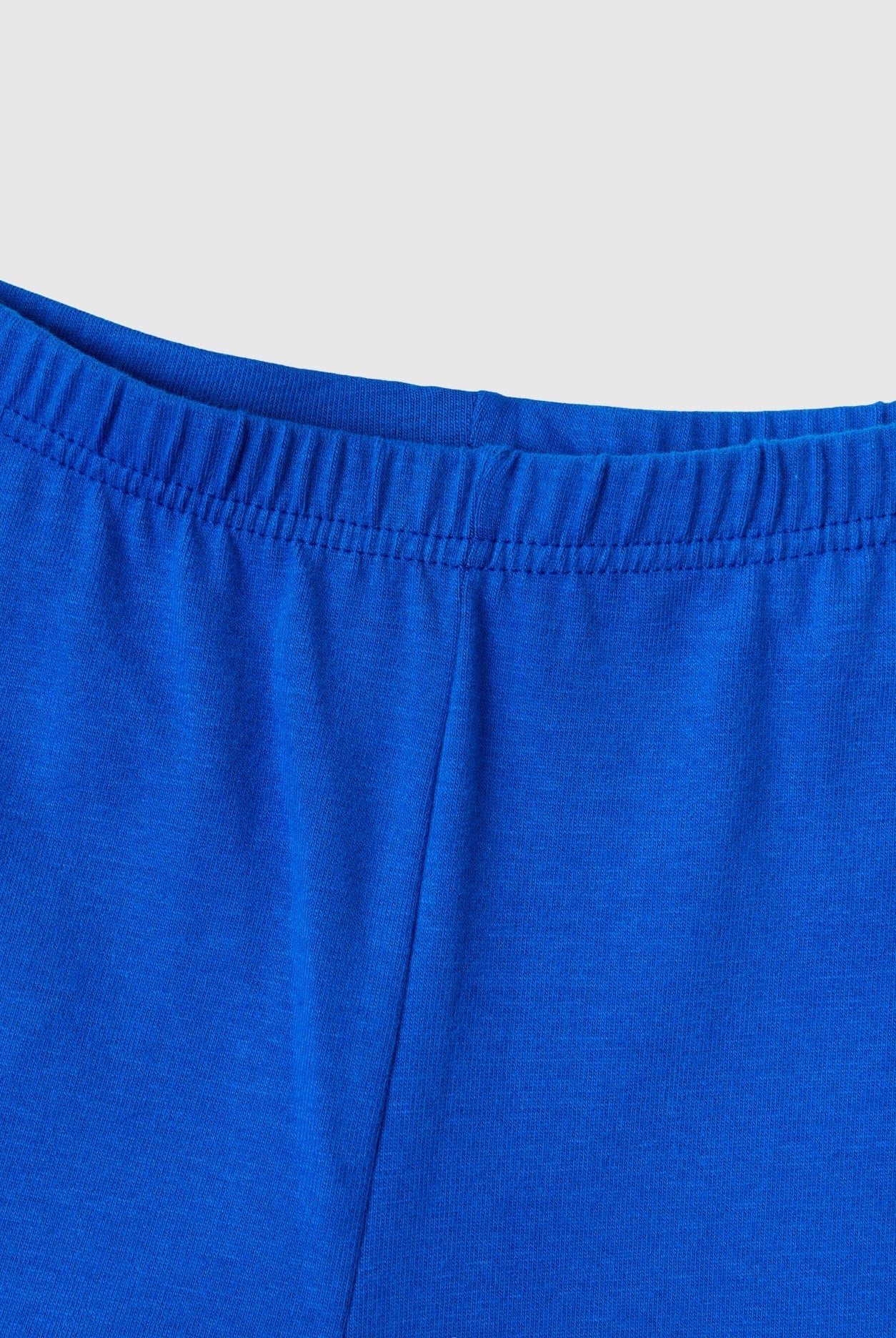 يونايتد كولورز اوف بينيتون بيجاما طويلة اطفالي من الجيرسيه الدافئ مع طباعة شعار عالصدر