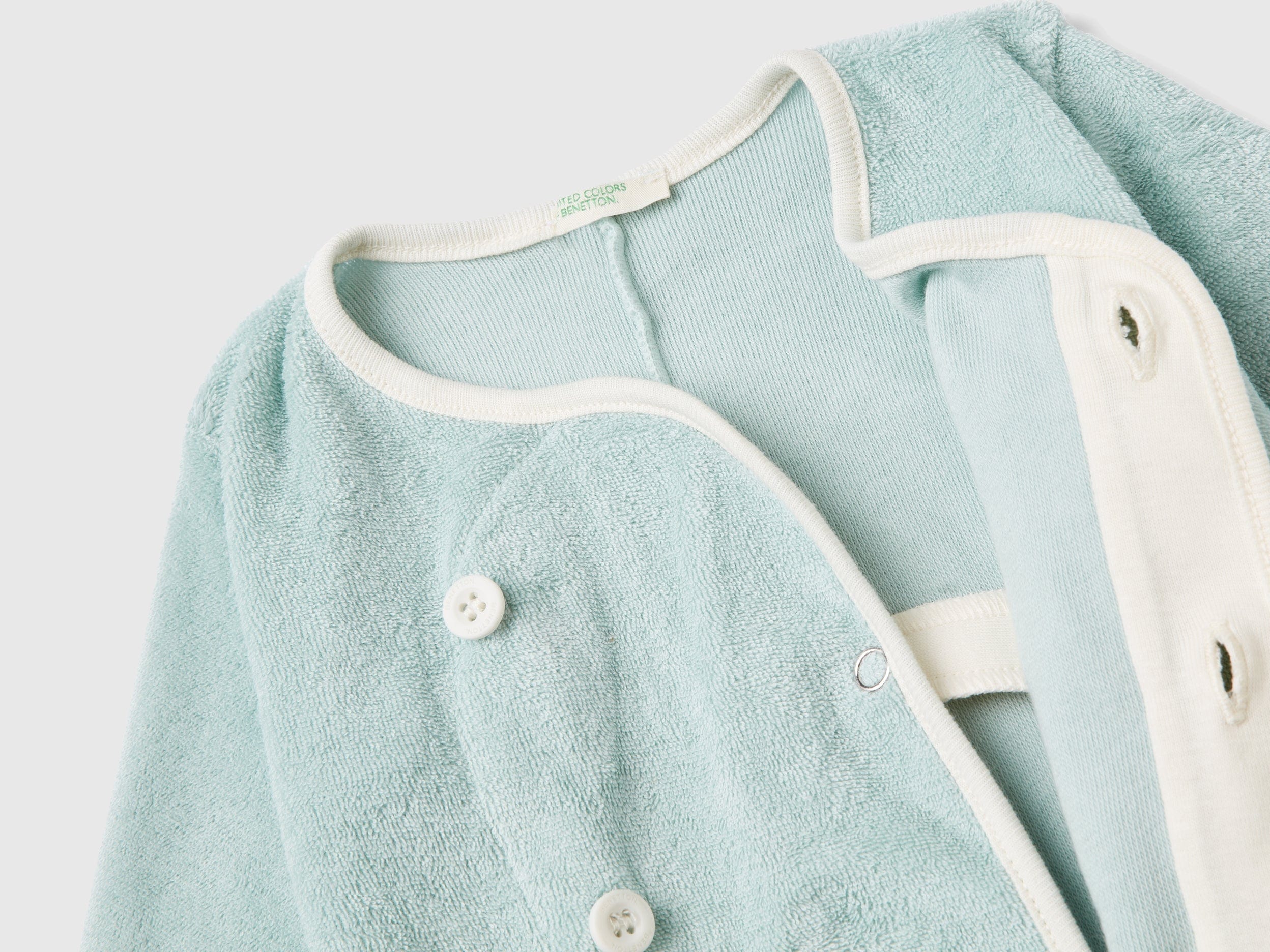 يونايتد كولورز اوف بينيتون سالوبيت رضع من قماش التيري مع رقعة