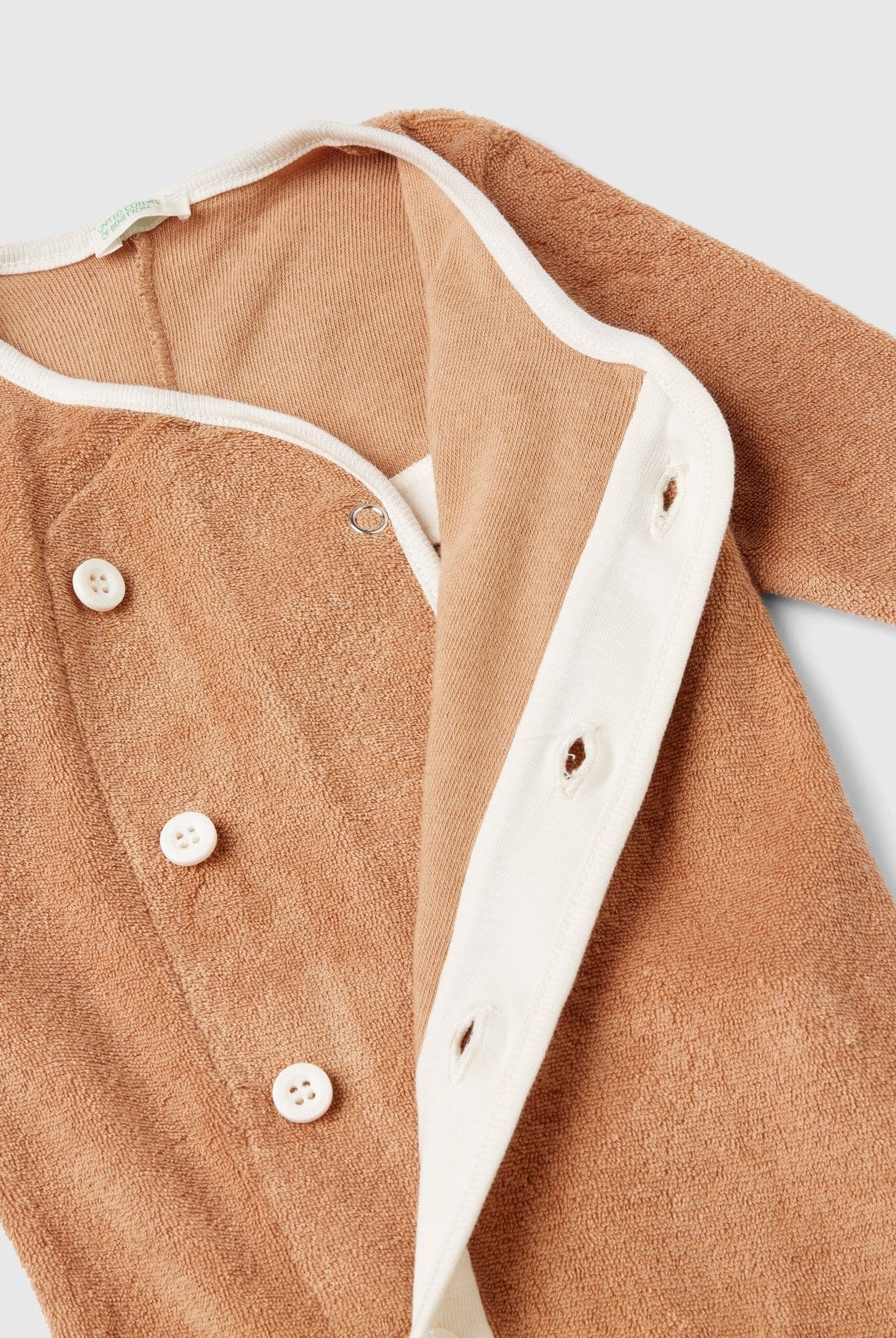 يونايتد كولورز اوف بينيتون سالوبيت رضع من قماش التيري مع رقعة