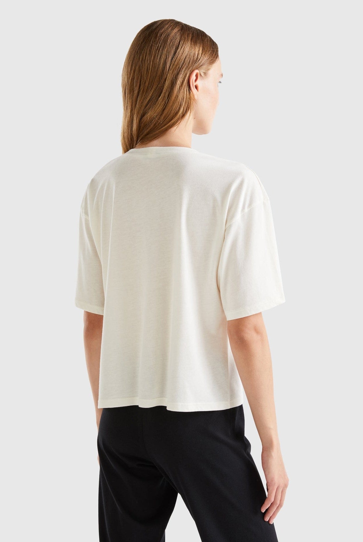 يونايتد كولورز اوف بينيتون تيشيرت واسع بنقشة زهور نص كم نسائي